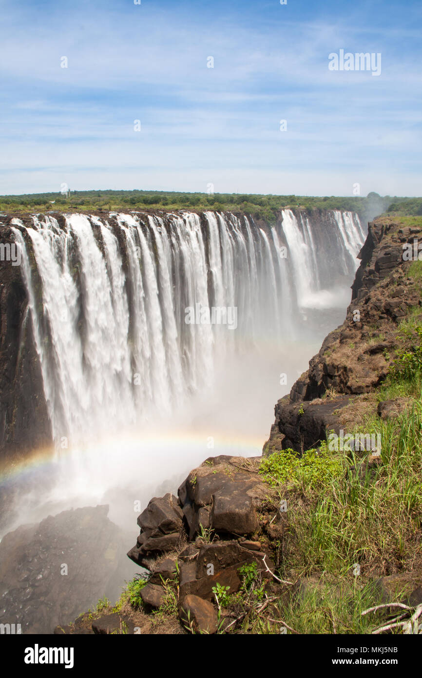 Victoria Falls avec arc-en-ciel, Zimbabwe Banque D'Images