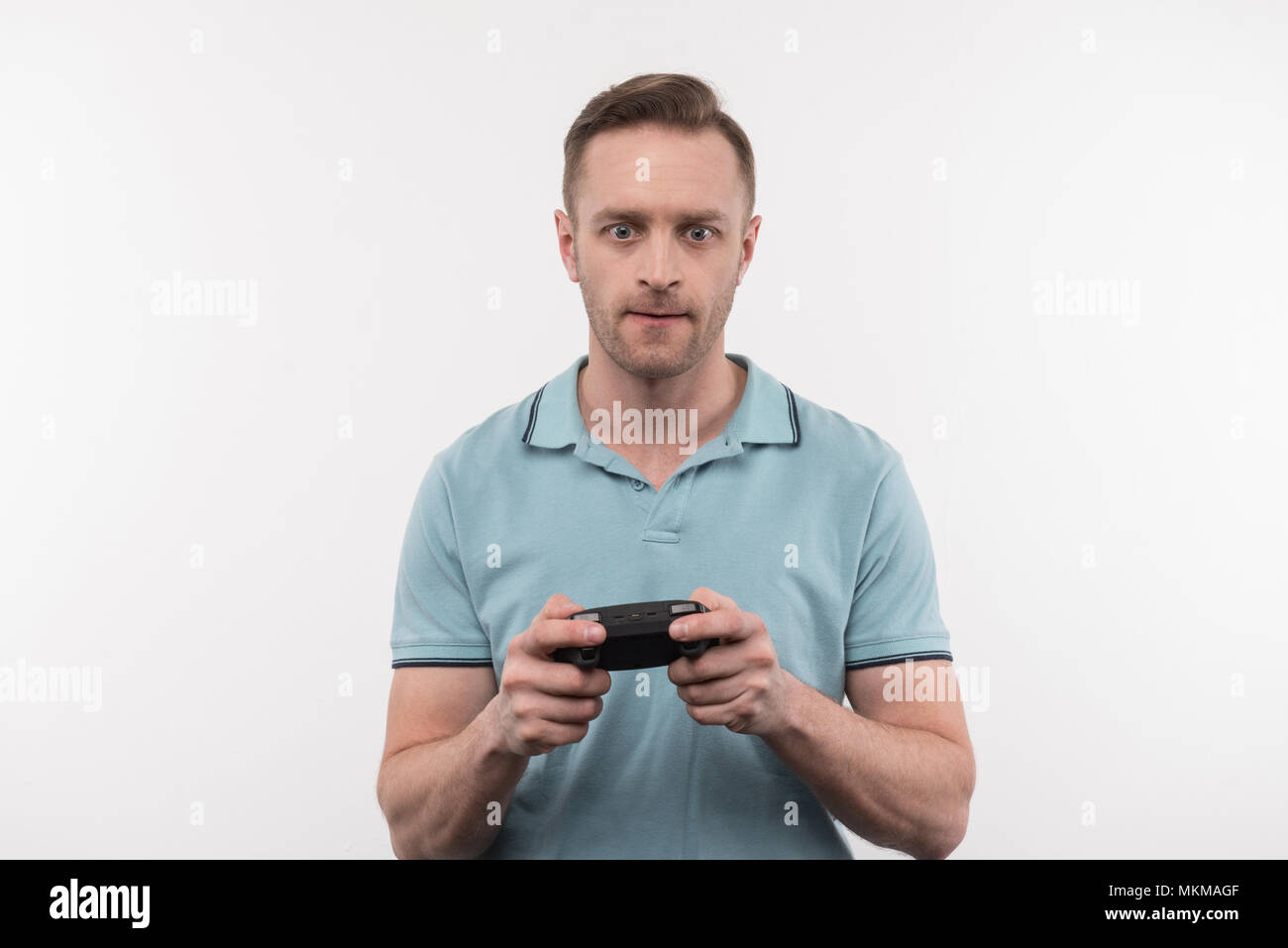 Beau nice man playing video games Banque D'Images