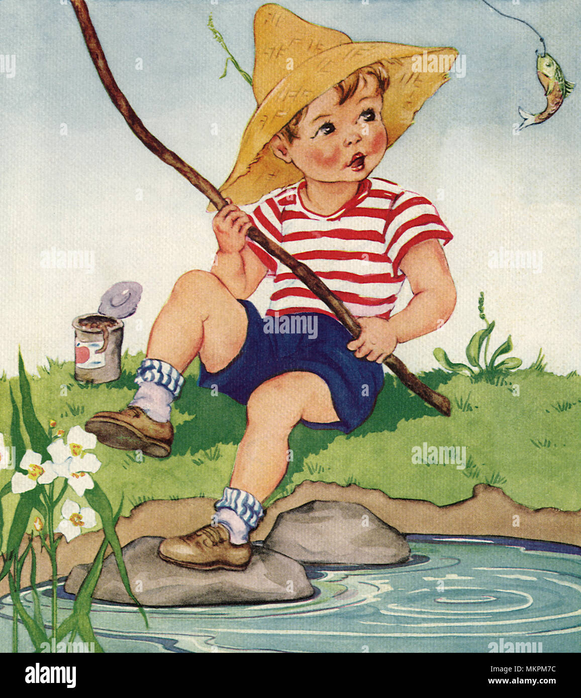 Poissons captures garçon Banque D'Images