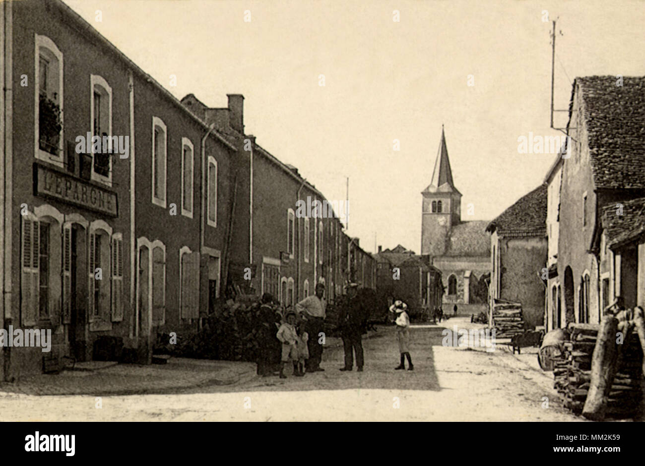 La rue de l'église. Liffol-le-Grand. 1910 Banque D'Images