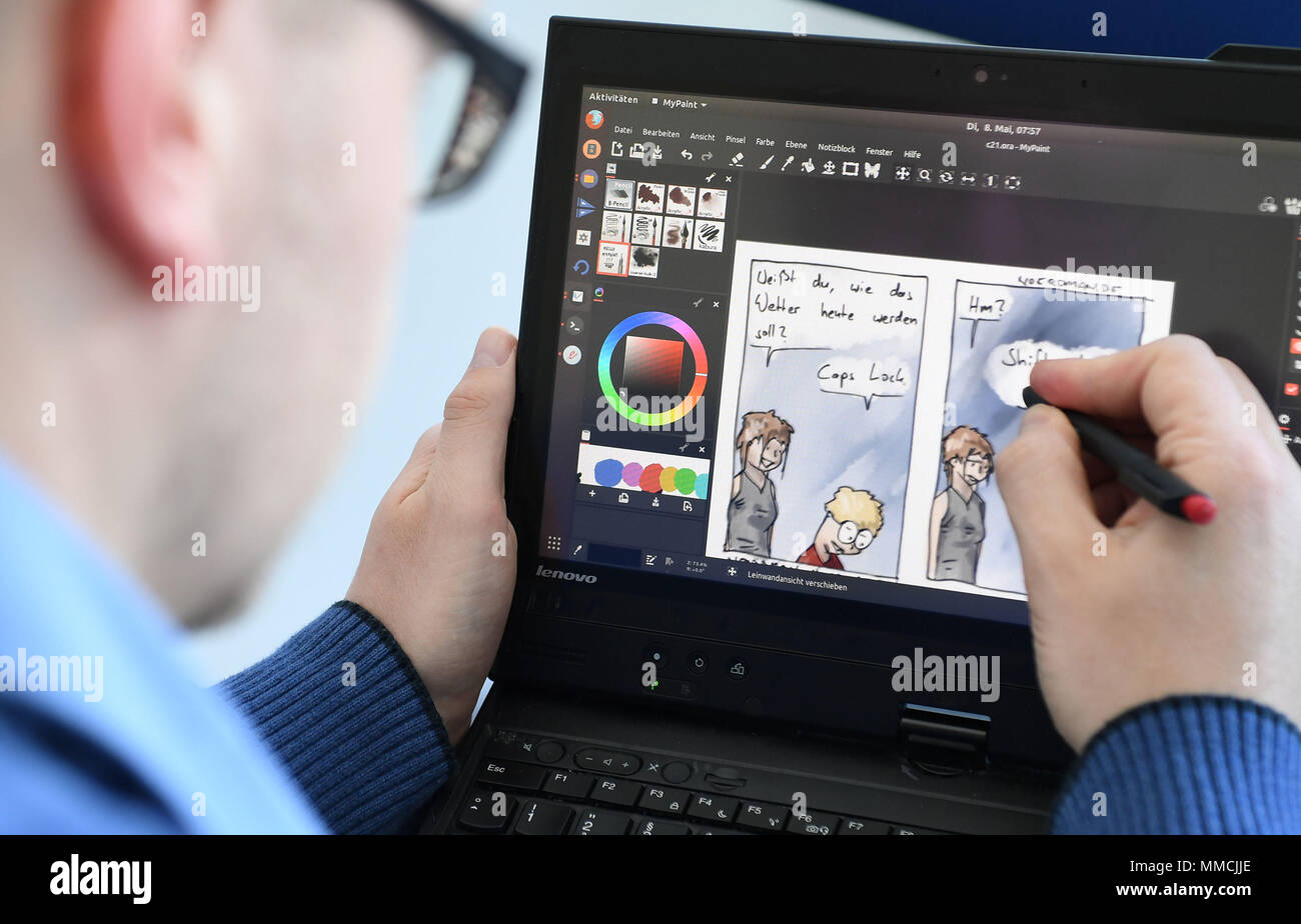 08 mai 2018, l'Allemagne, Bremen : Jannis Stoppe l'élaboration d'une bande dessinée sur son ordinateur qui peut être vu sur l'internet sous www.noerdman.de. La bande dessinée est sur la technologie, des nerds et le nord. Stoppe les mots ensemble avec l'informaticien Rolf Drechsler de l'université de Brême. Photo : Carmen Jaspersen/dpa Banque D'Images