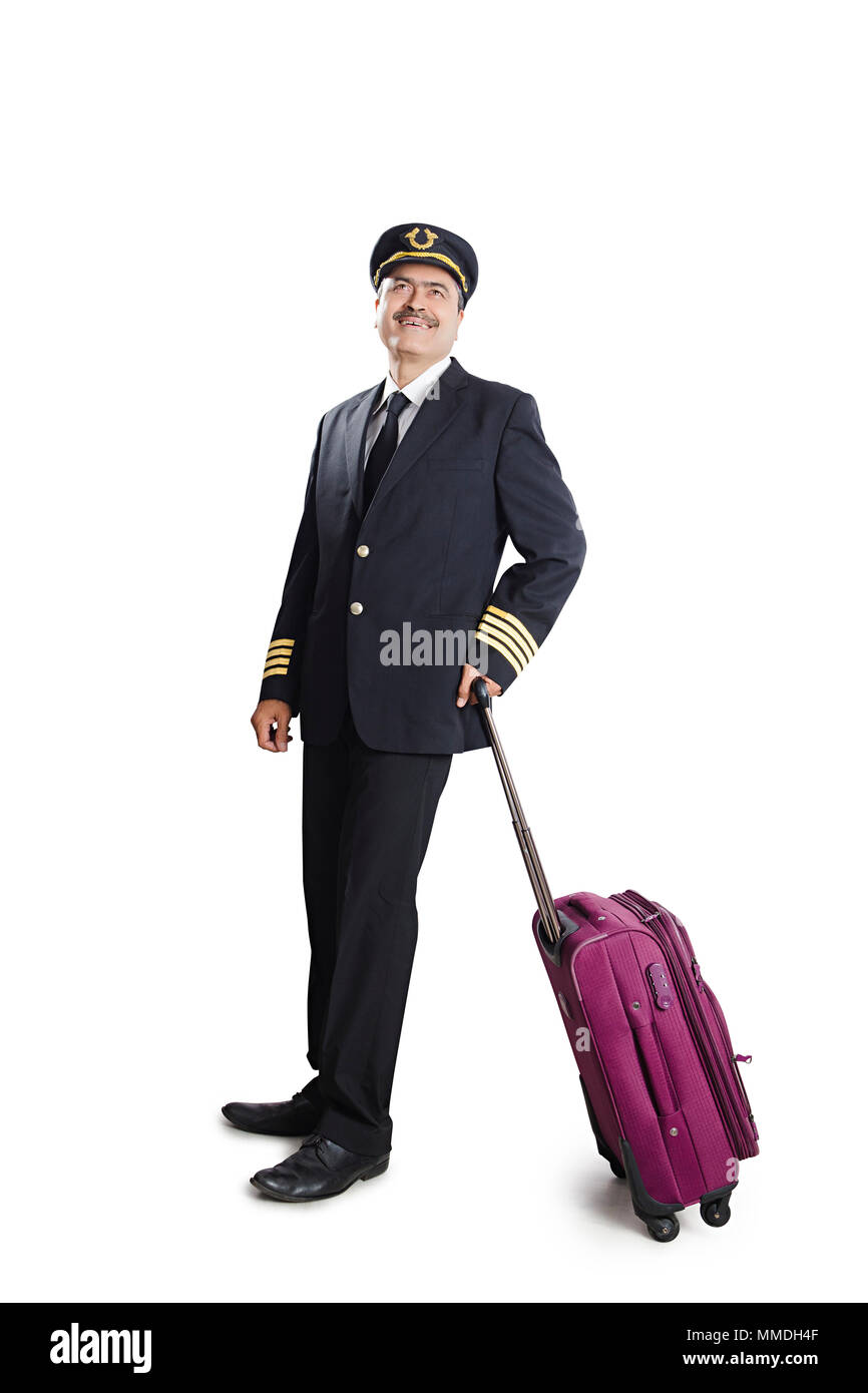 Senior Male de ligne pilote Looking-Up regardant leaning Assurance Comité Permanent Banque D'Images