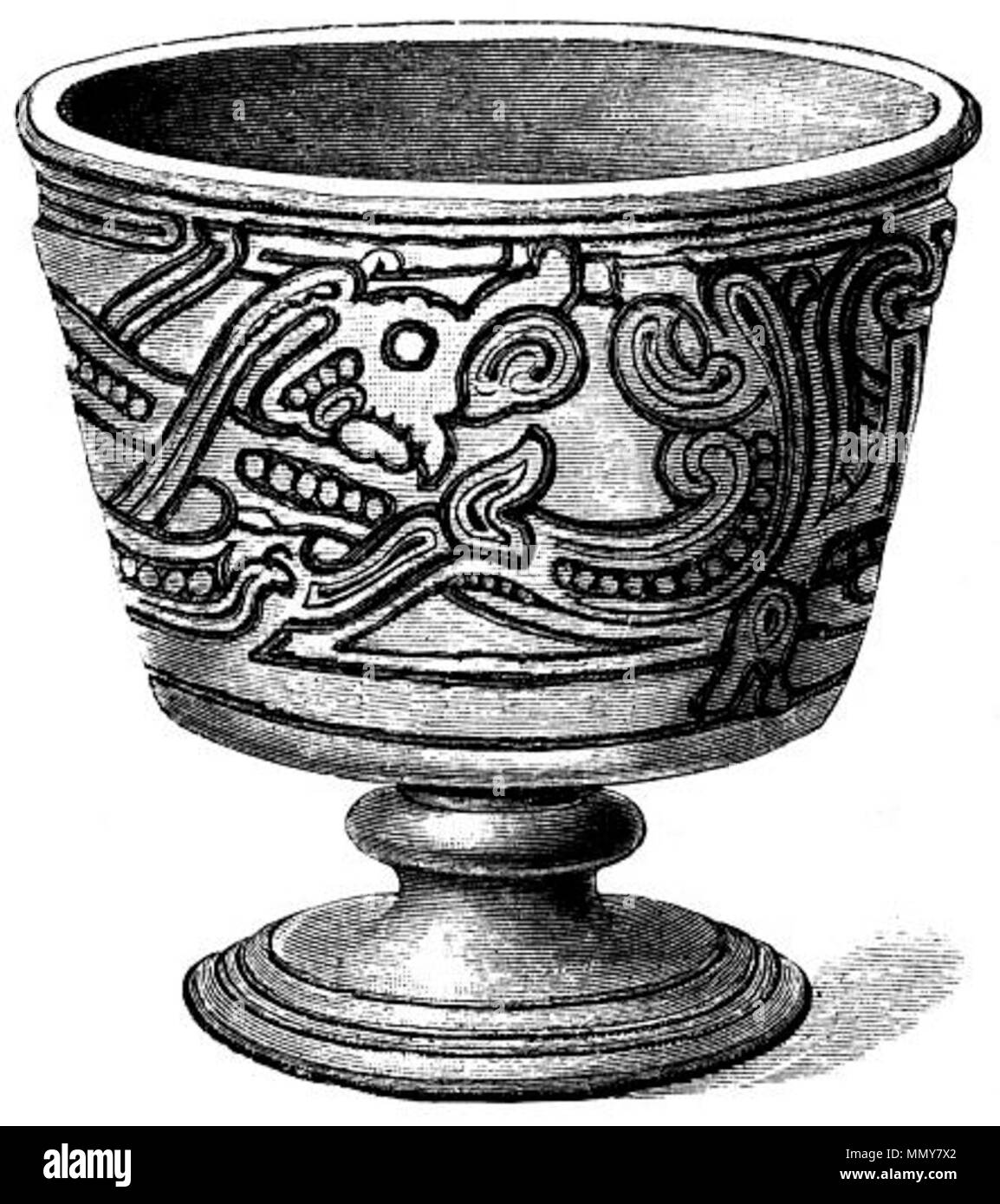 . "Trouvé dans l'immense lit barrow dans lequel le roi païen Gorm l'Ancien, fondateur de la monarchie danoise (ch. 900-936), et son épouse chrétienne Thyra, ont été enterrés côte à côte à Jelling au Jutland. [...] La coupe est d'argent, à l'intérieur, doré et ornée d'un motif mythologique anciennes des serpents et des animaux fantastiques." . Ce fichier n'est pas informations sur l'auteur. Gorm coupe d'argent Banque D'Images