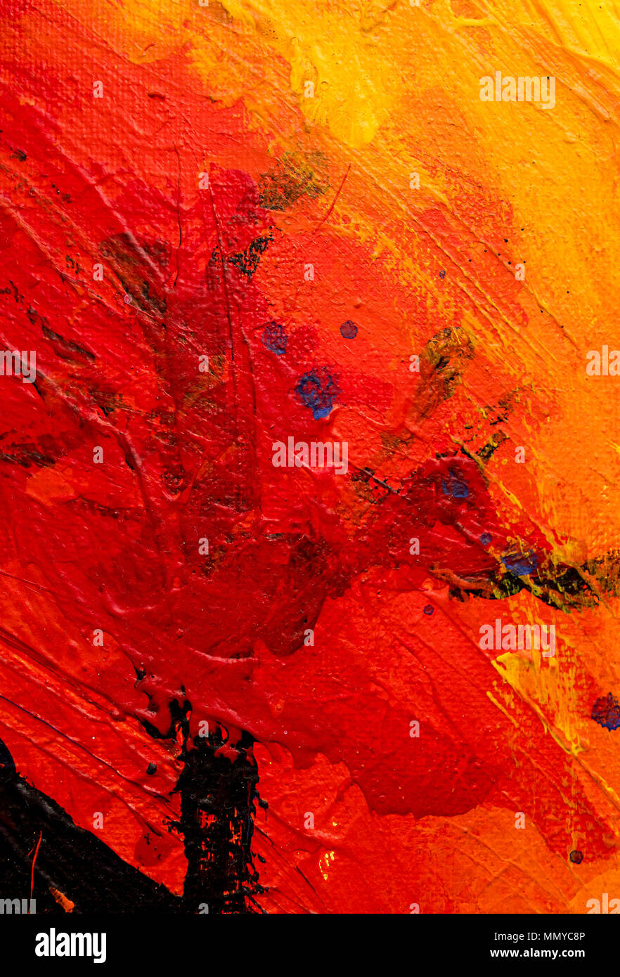 Un vibrant et coloré, l'huile et l'acrylique la peinture abstraite sur toile peint avec des coups de pinceau libre et sauvage en rouge, orange et jaune Banque D'Images