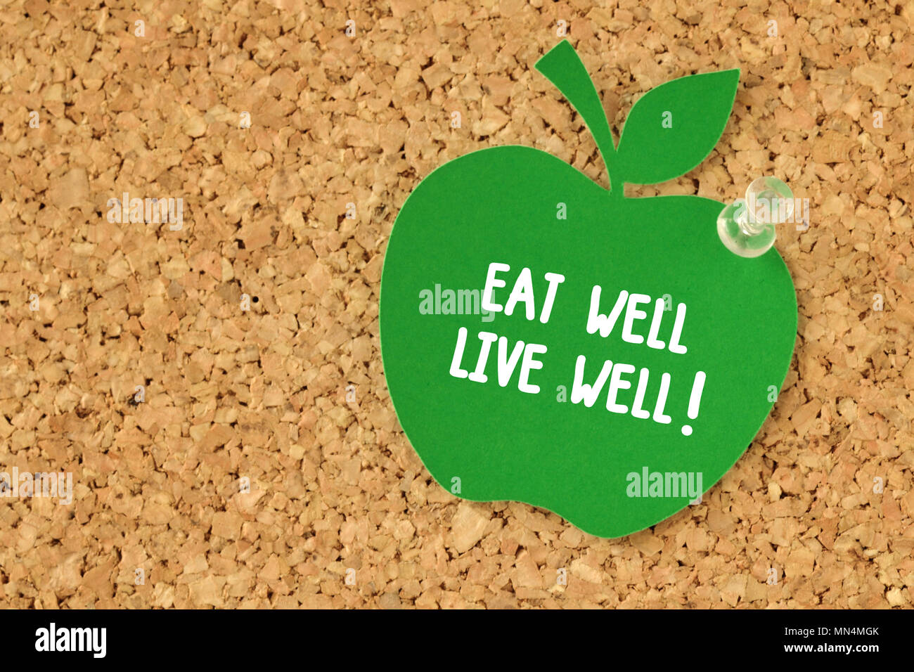 Manger mieux, c'est ! Écrit sur papier en forme de pomme note sur les favoris Banque D'Images