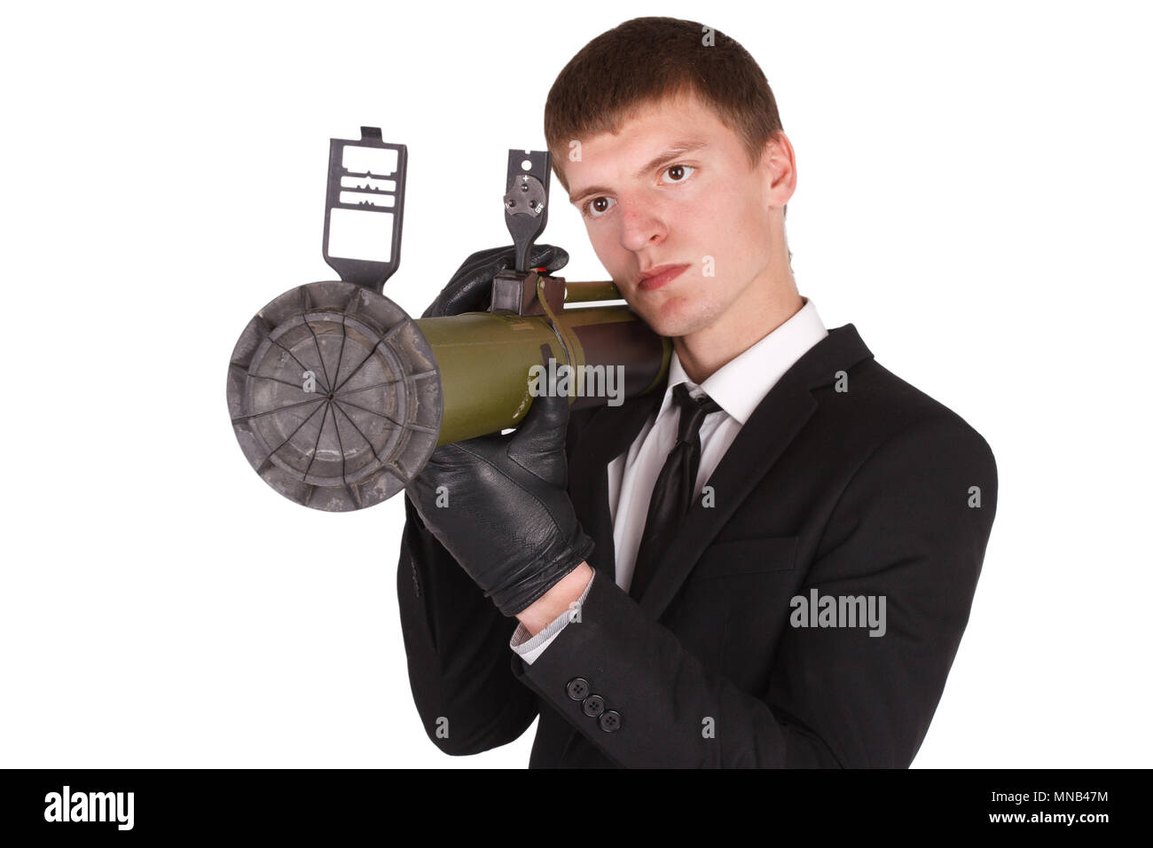 L'homme en costume noir et bazooka isolated on white Photo Stock - Alamy