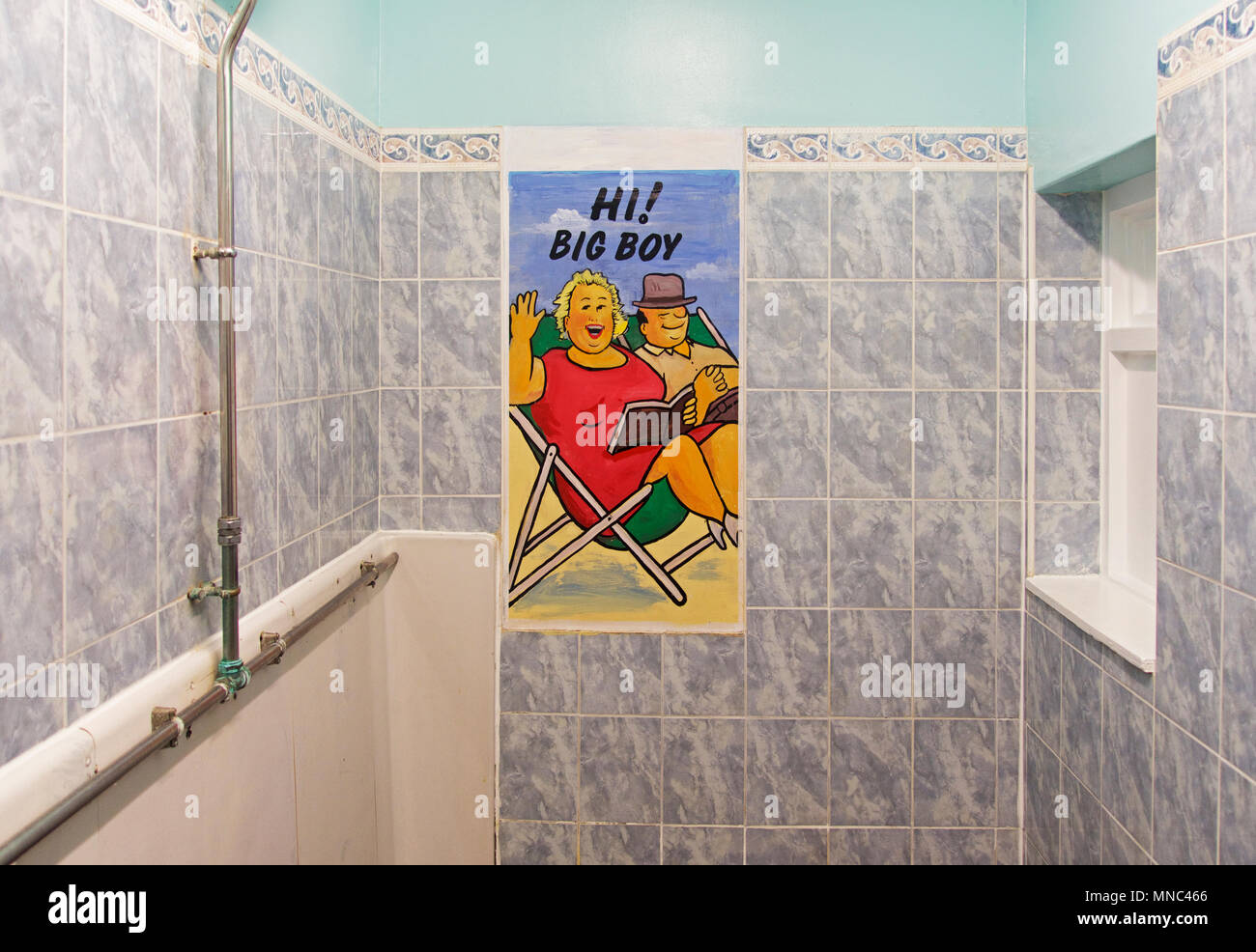 Urinoir pour hommes avec affiche - Hi, Big Boy - England UK Banque D'Images
