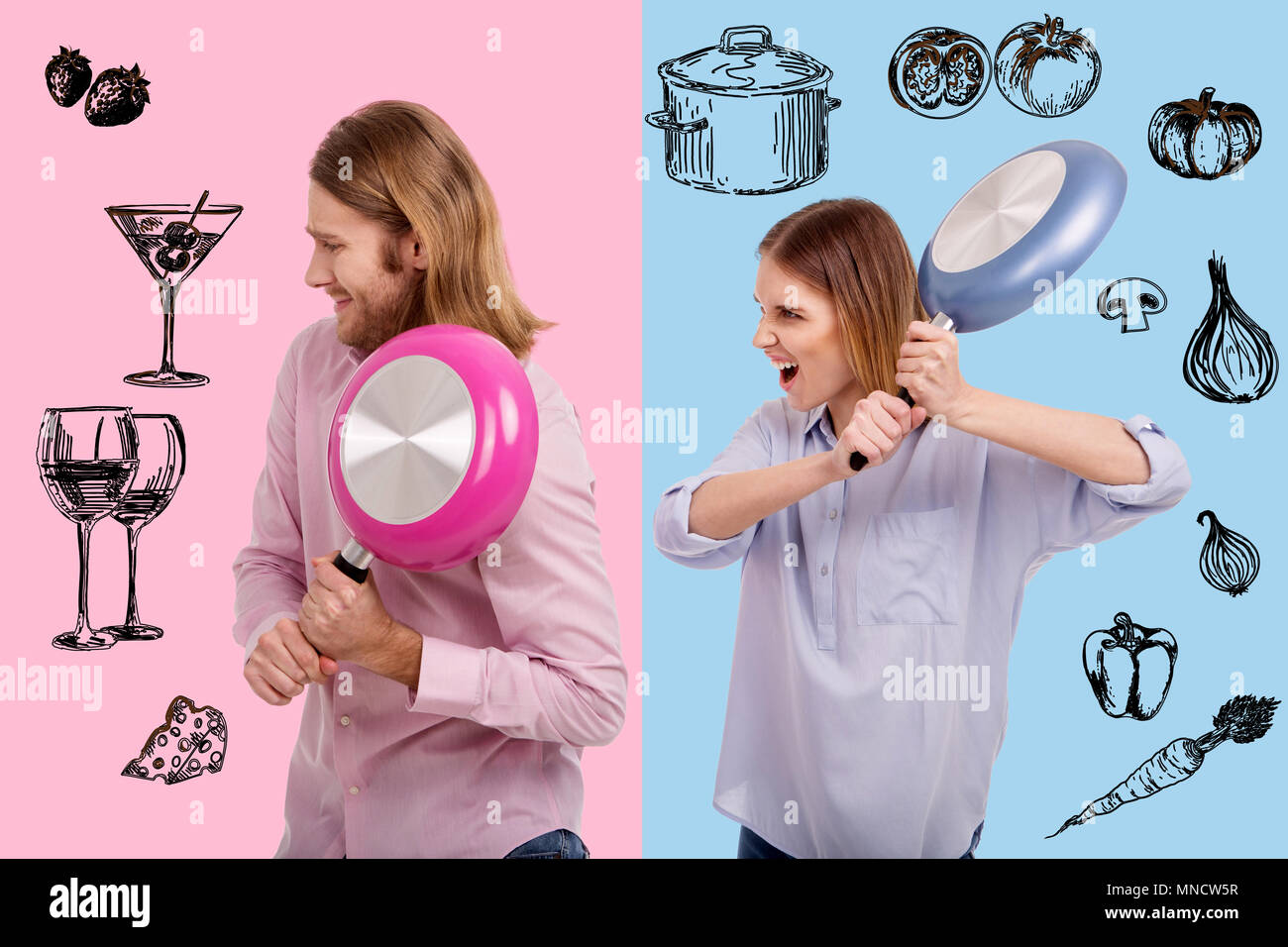Couple émotionnel des poêles à frire et ayant un peu de lutte Banque D'Images