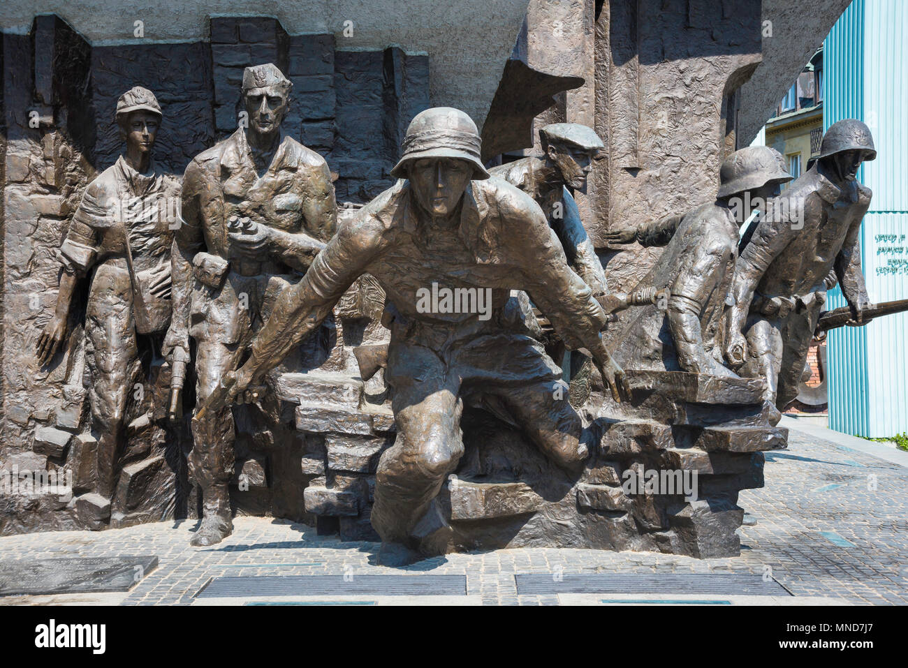 Détail de combattants de la résistance polonaise dépeints dans le Monument à l'Insurrection de Varsovie dans Krasinskich plac dans le centre de Varsovie, Pologne. Banque D'Images