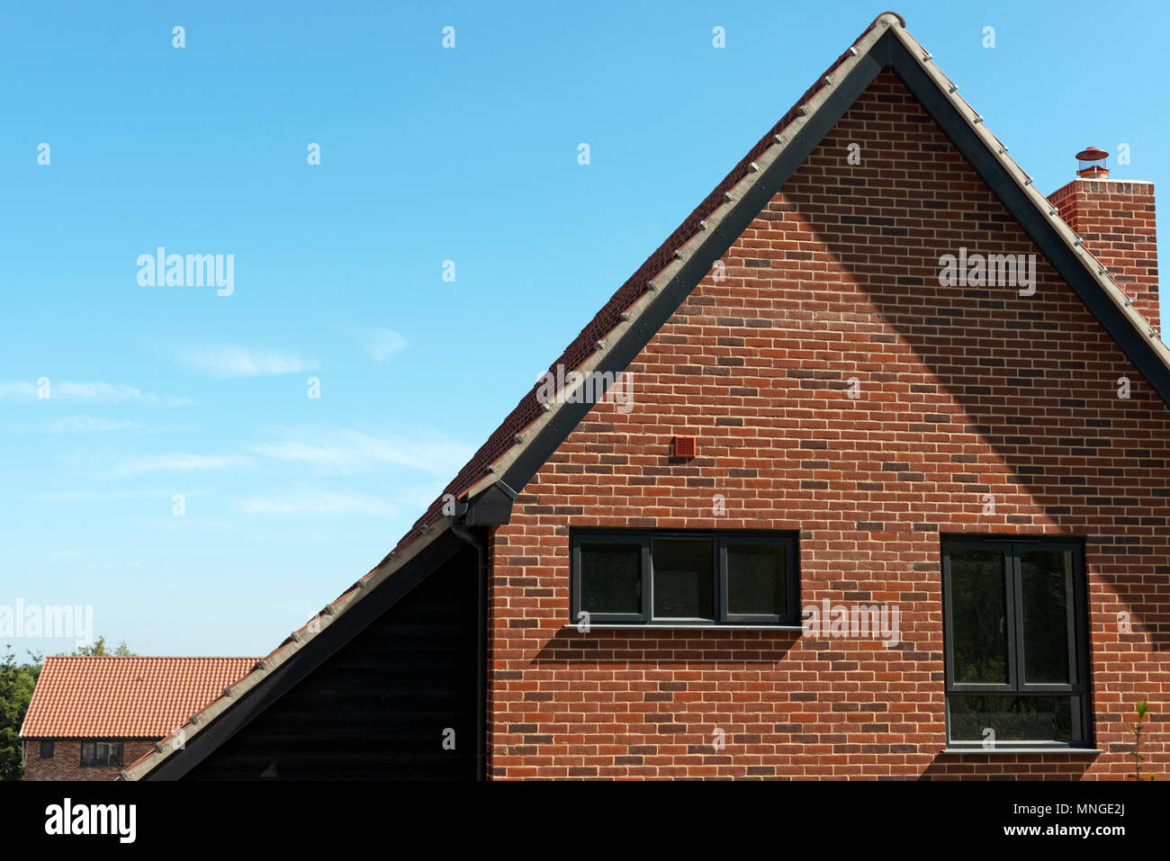 De nouvelles maisons construites sur un champ brun site, Ufford, Suffolk, UK. Banque D'Images