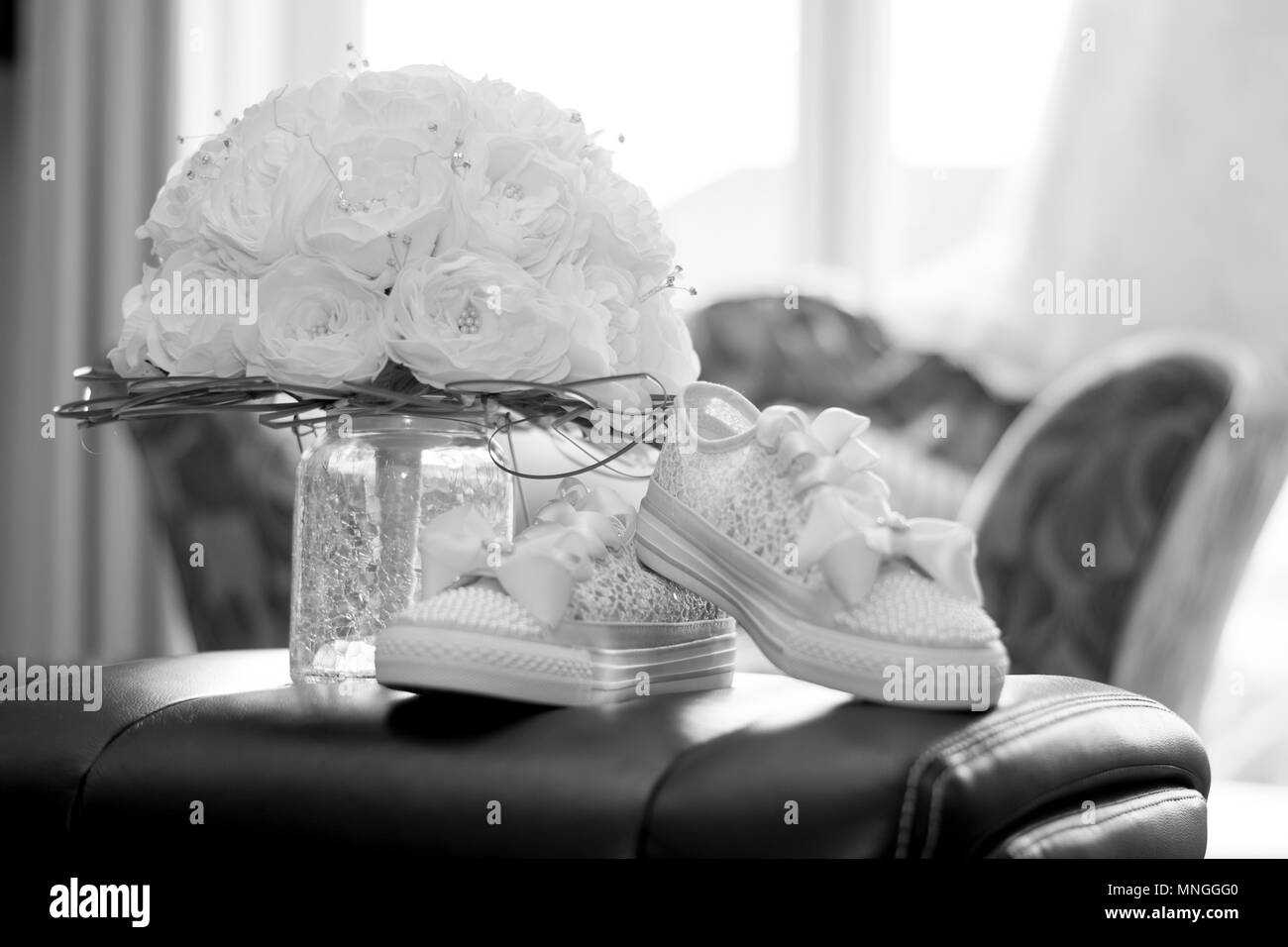 Des fleurs de mariage et les chaussures Banque D'Images