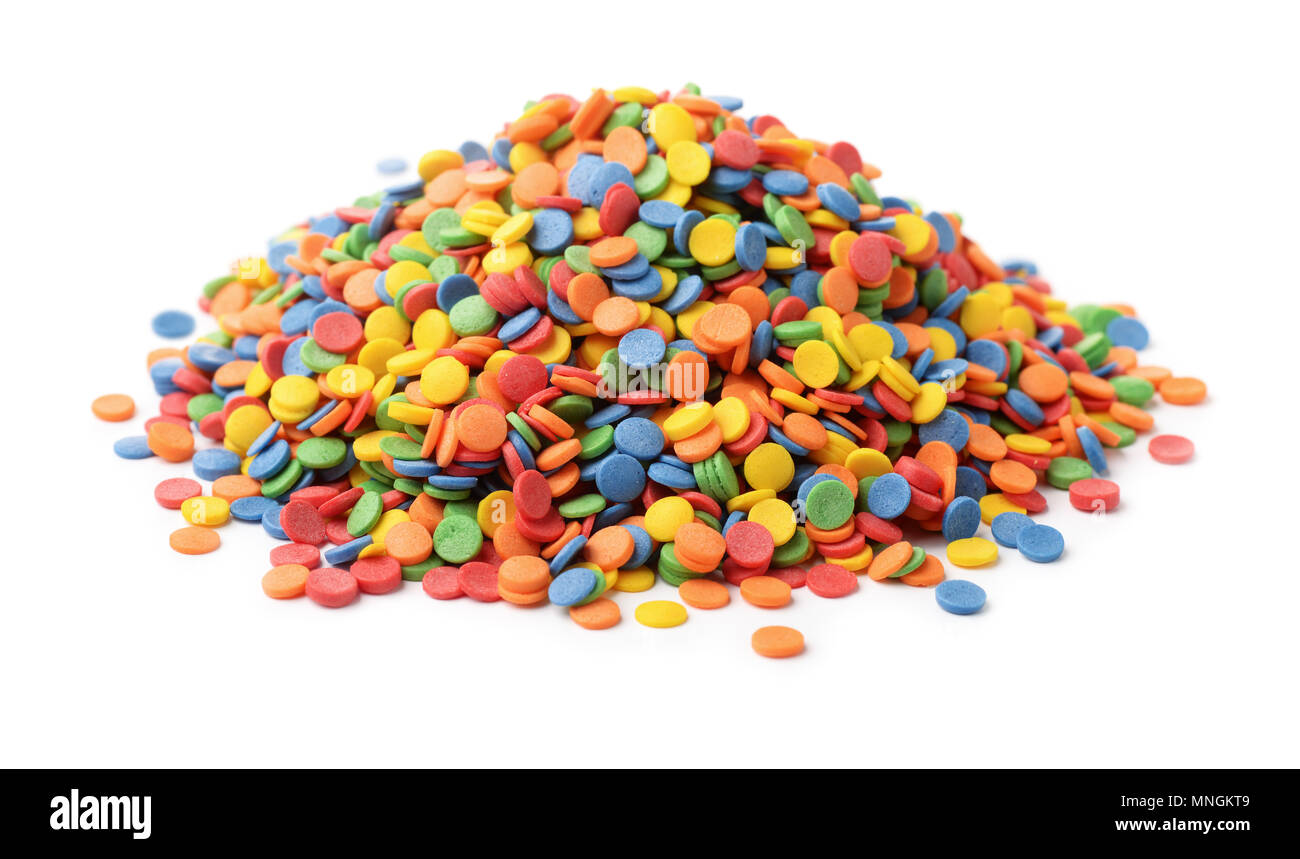 Tas de confettis ronds candy sprinkles isolated on white Banque D'Images