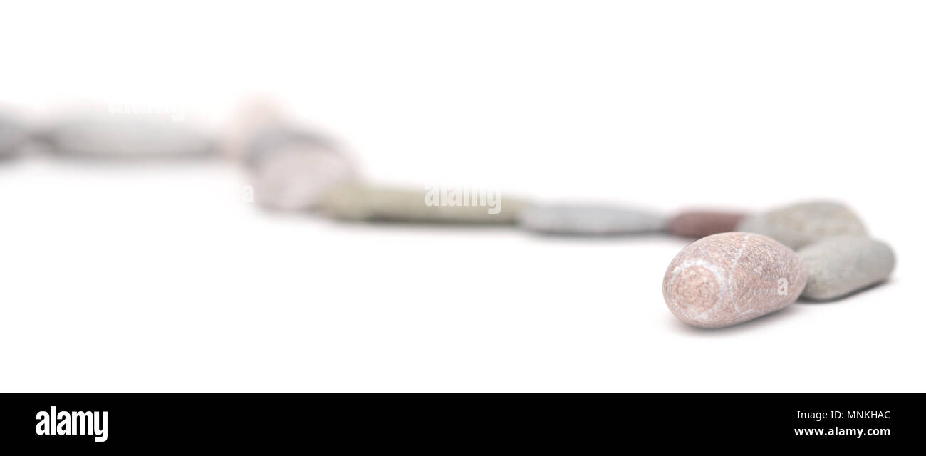 Pebbles on white Banque D'Images