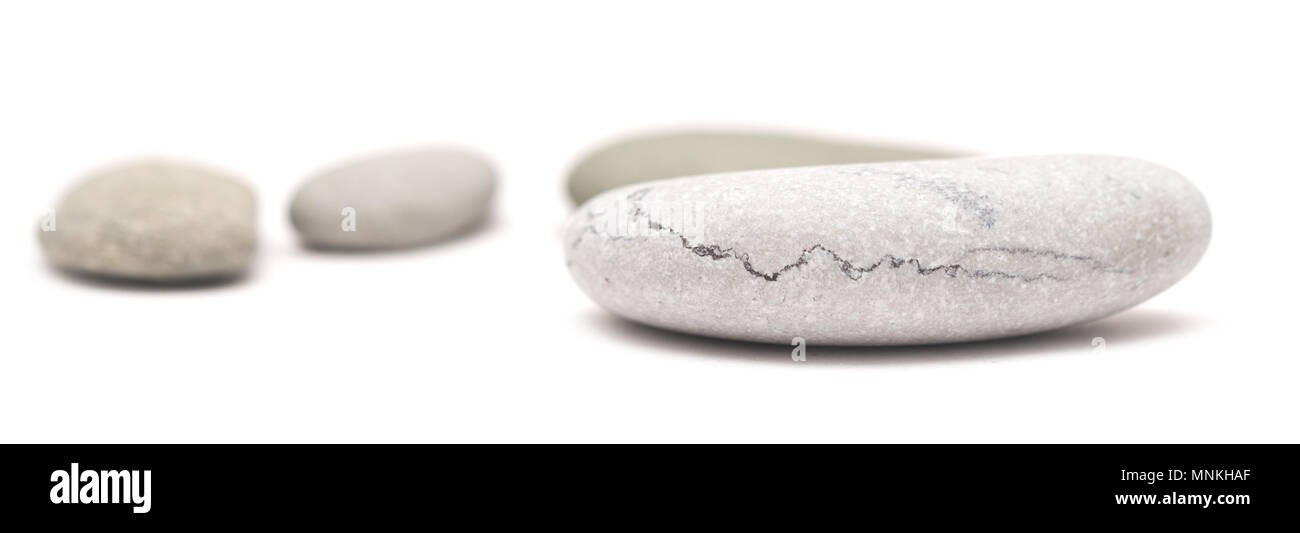 Pebbles on white Banque D'Images