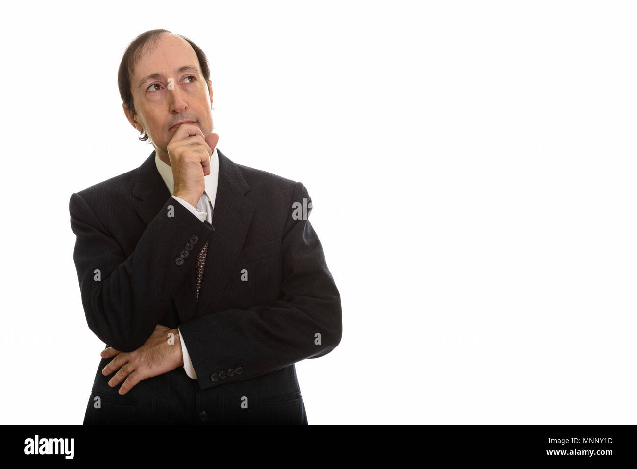 Studio shot of businessman thinking Banque D'Images