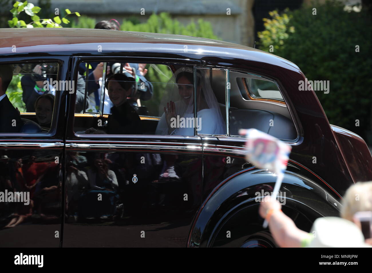 Meghan Markle et son cortège arrivent à la Chapelle St George du château de Windsor pour son mariage avec le prince Harry. Banque D'Images