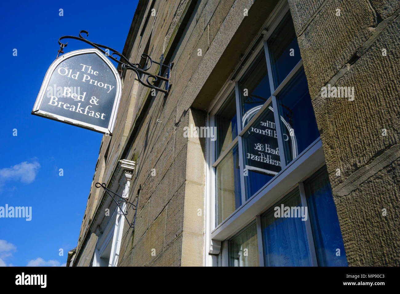 Ancien prieuré Guest House sign, Kelso, l'Écosse. Banque D'Images