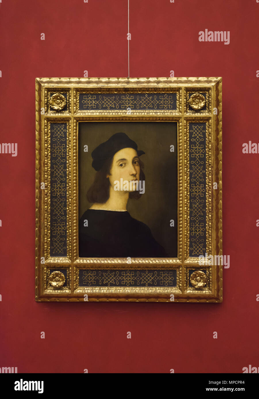 Auto-portrait de peintre italien de la Renaissance Raphaël datée de 1506 environ sur l'affichage dans la galerie des Offices (Galleria degli Uffizi), à Florence, Toscane, Italie. Banque D'Images