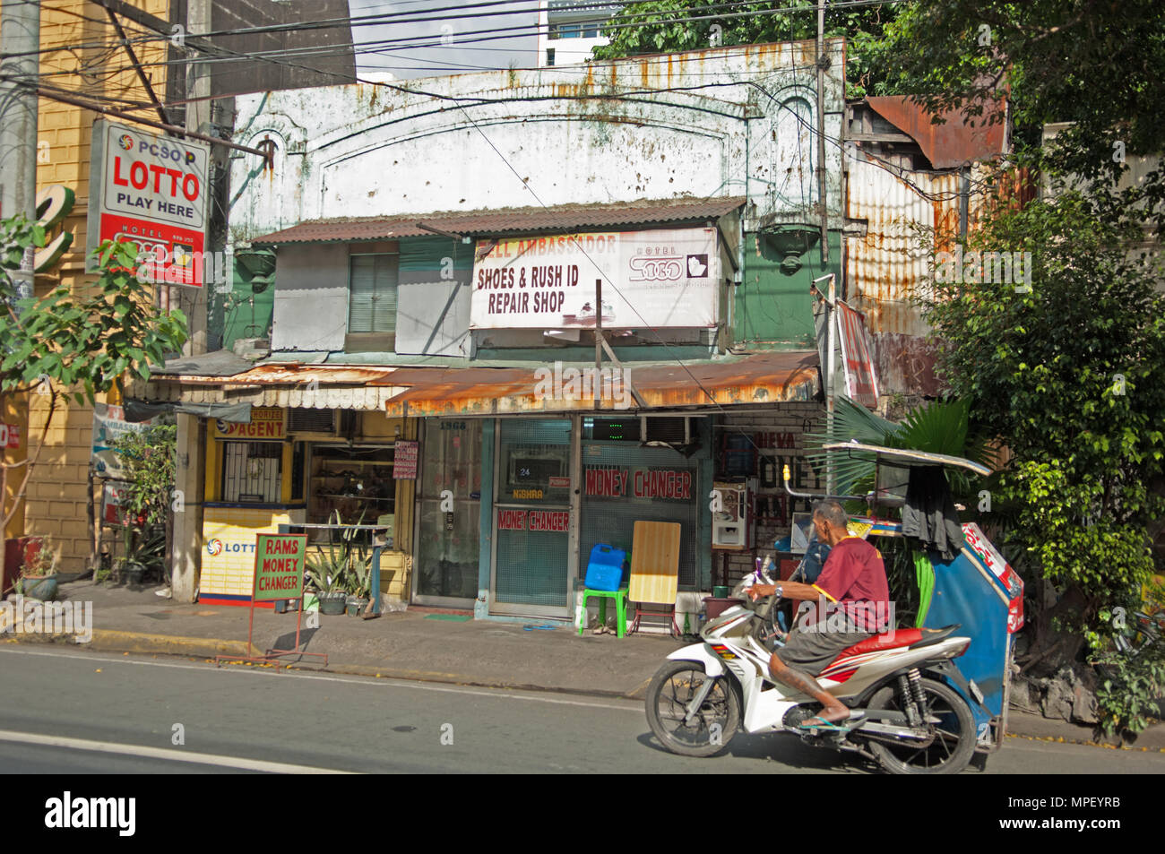 Un changeurs d'argent boutique, Manille, Philippines Banque D'Images
