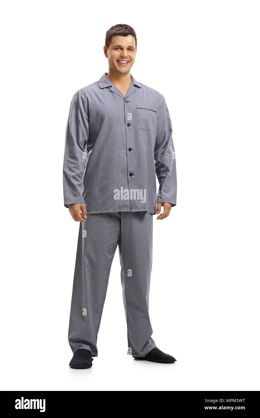 Portrait d'un jeune homme en pyjama smiling isolé sur fond blanc Banque D'Images