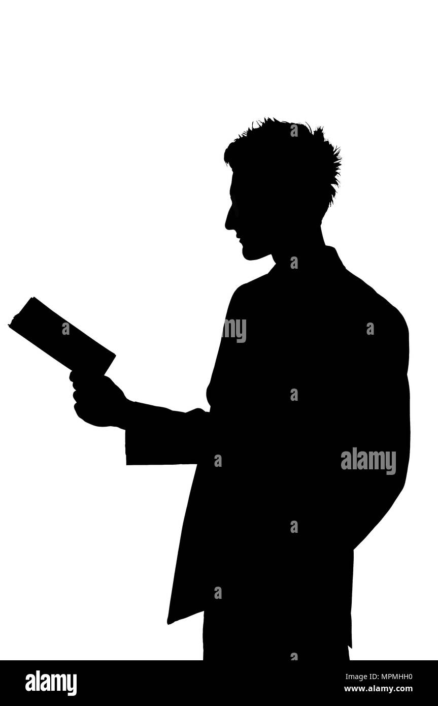 Jeune homme qui lit un livre Photo Stock - Alamy