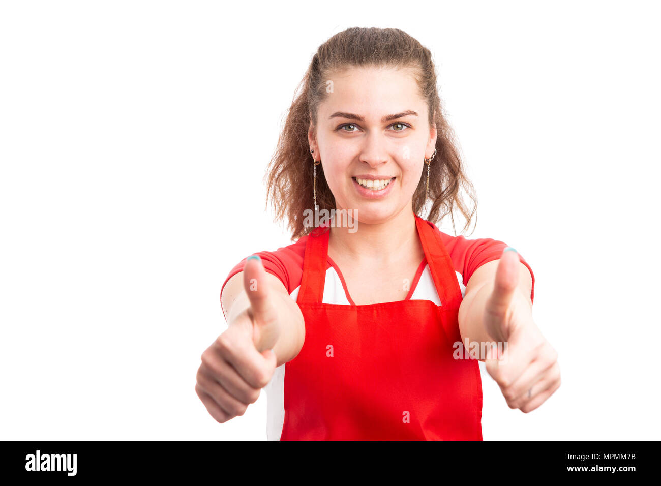 Jeune femme de l'employé de supermarché showing Thumbs up comme geste comme concept détaillant heureux isolé sur fond blanc Banque D'Images