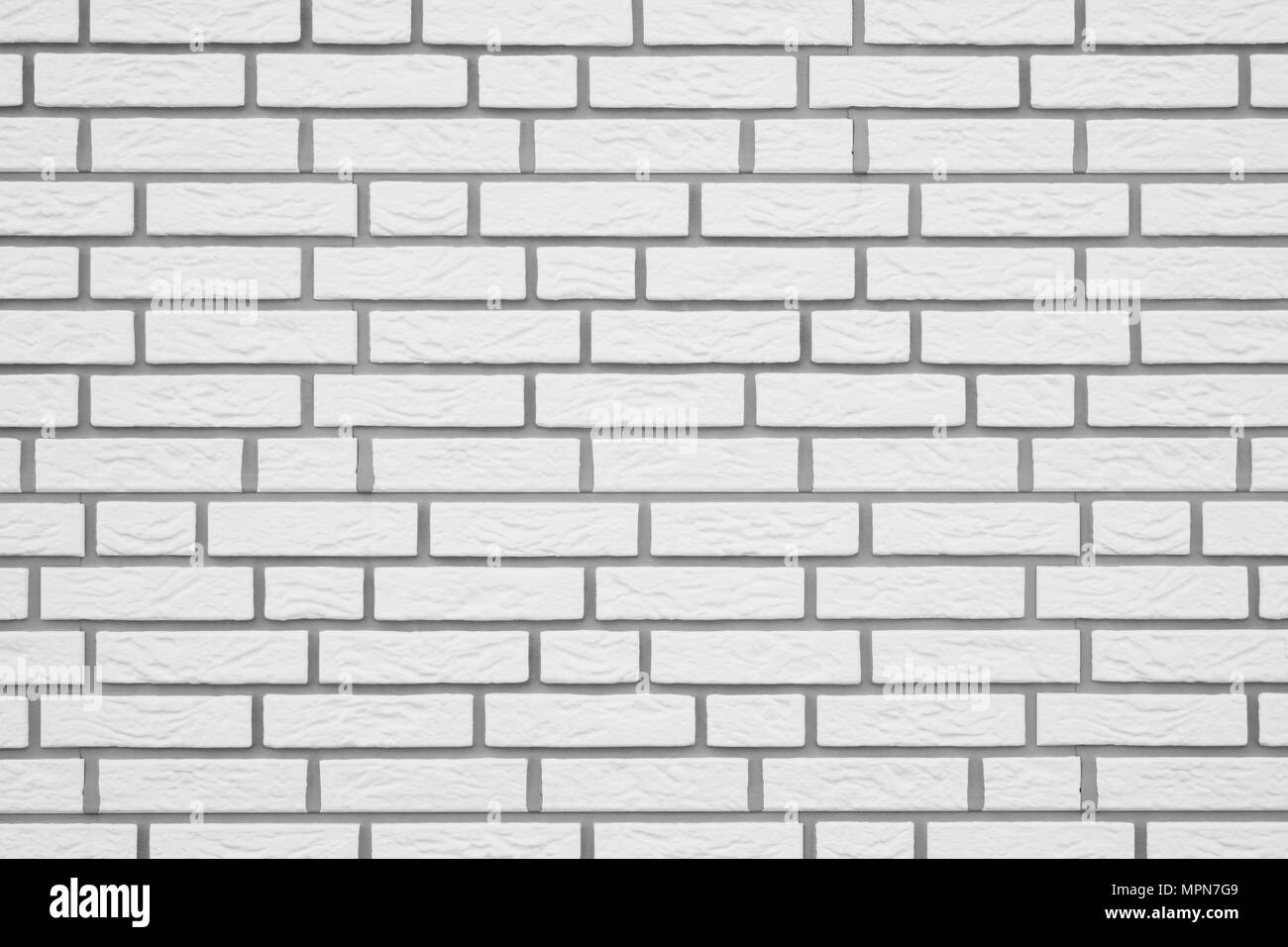 Mur en brique blanche avec fond de coulis gris texture pattern Banque D'Images