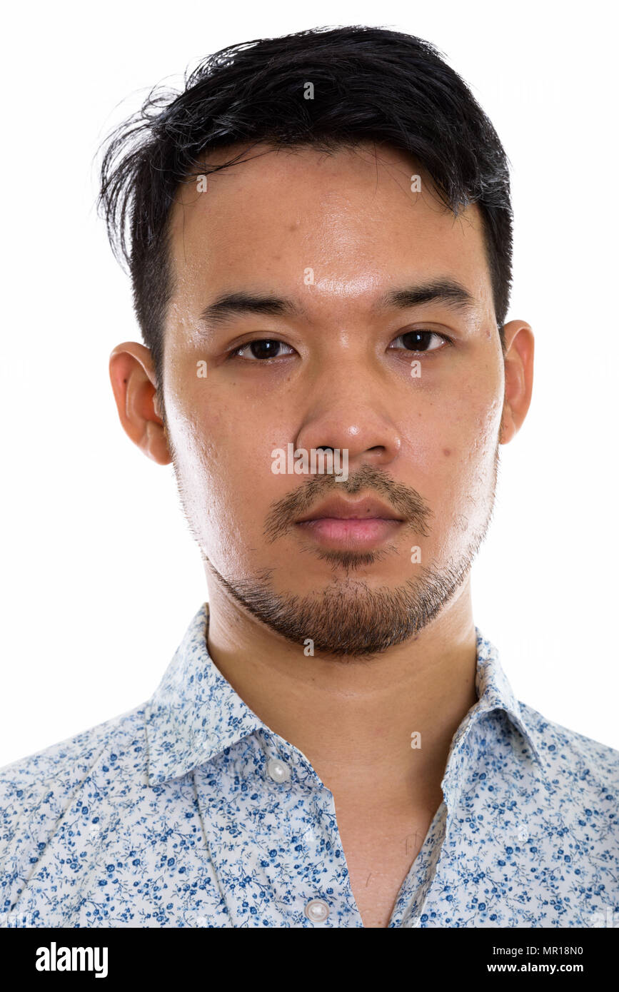 Portrait de face of young Asian man Banque D'Images
