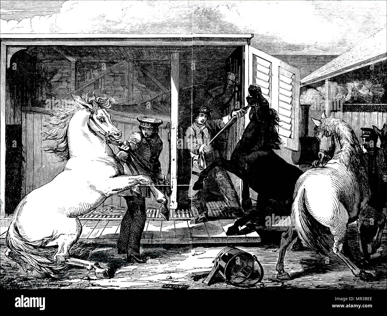 Gravure représentant des chevaux à une station de train d'être déplacé d'un conseil pour un wagon à voie étroite à la gare de Gloucester. En date du 19e siècle Banque D'Images