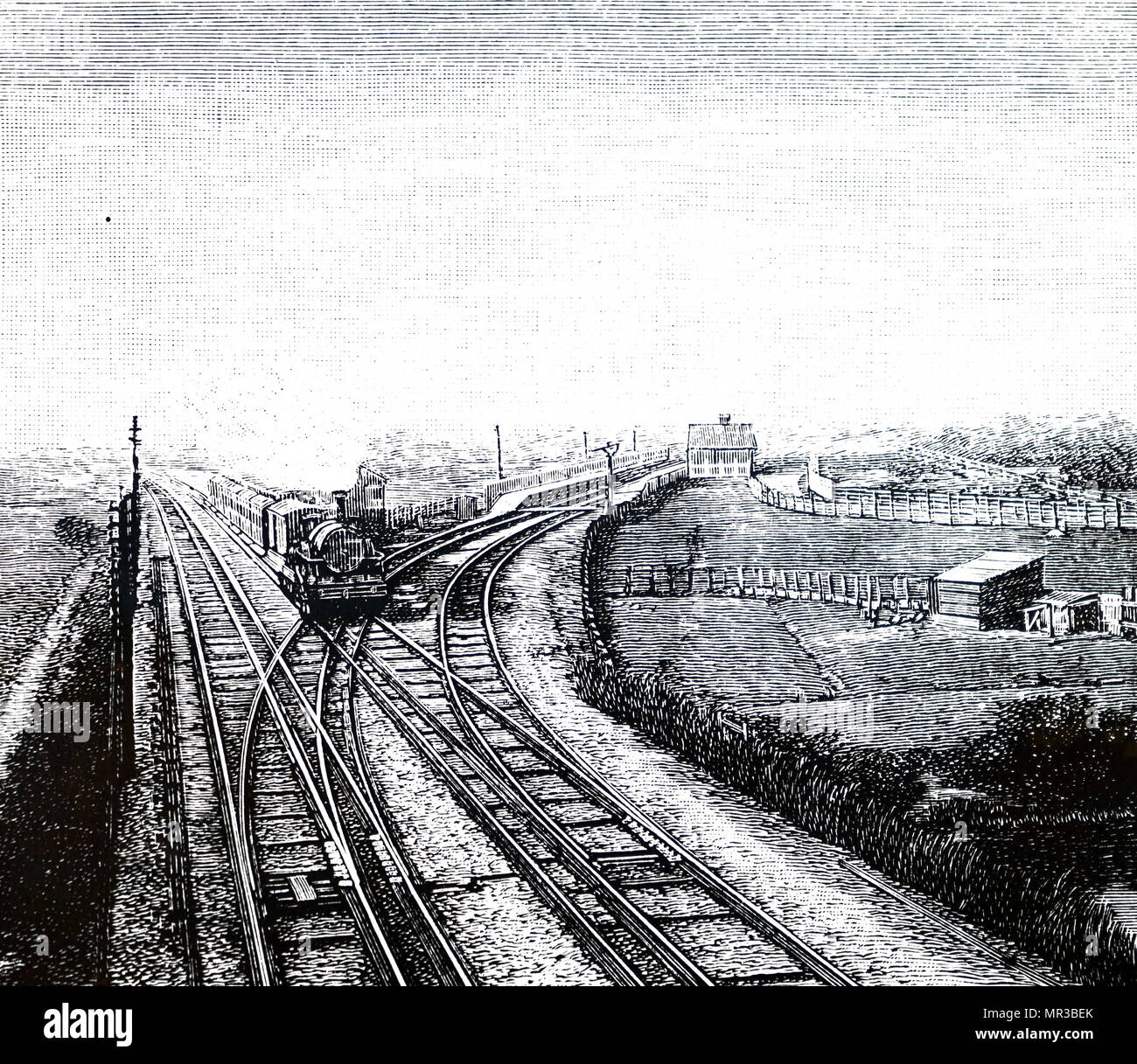 Gravure représentant un passage Express la jonction Worle, Somerset. Cette photo montre la complexité du système de points nécessaires pour conduire des trains de jauges mixtes sur le même terrain. En date du 19e siècle Banque D'Images