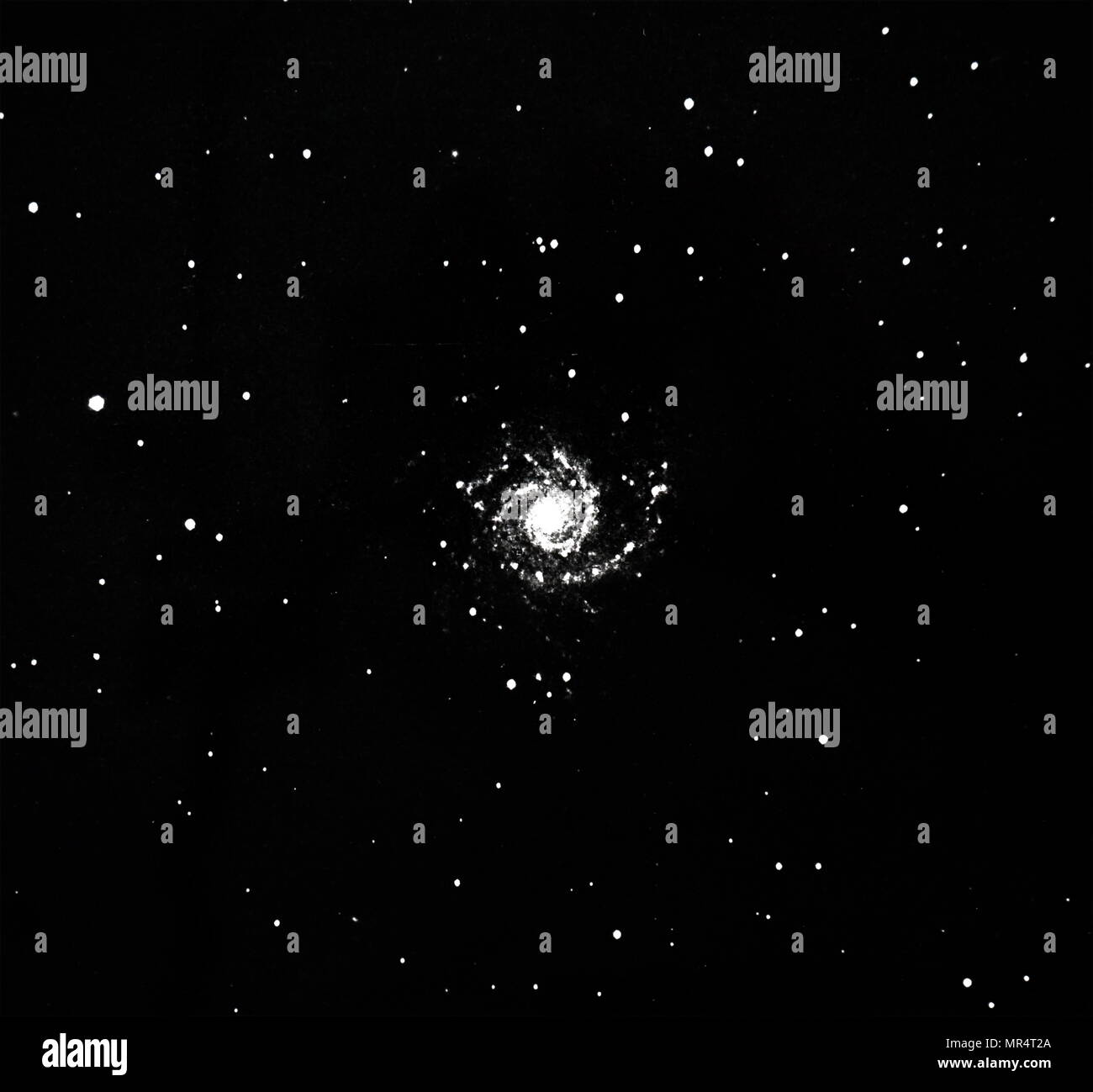 Photographie de galaxie spirale (M 74) dans constellation des Poissons. En date du 20e siècle Banque D'Images