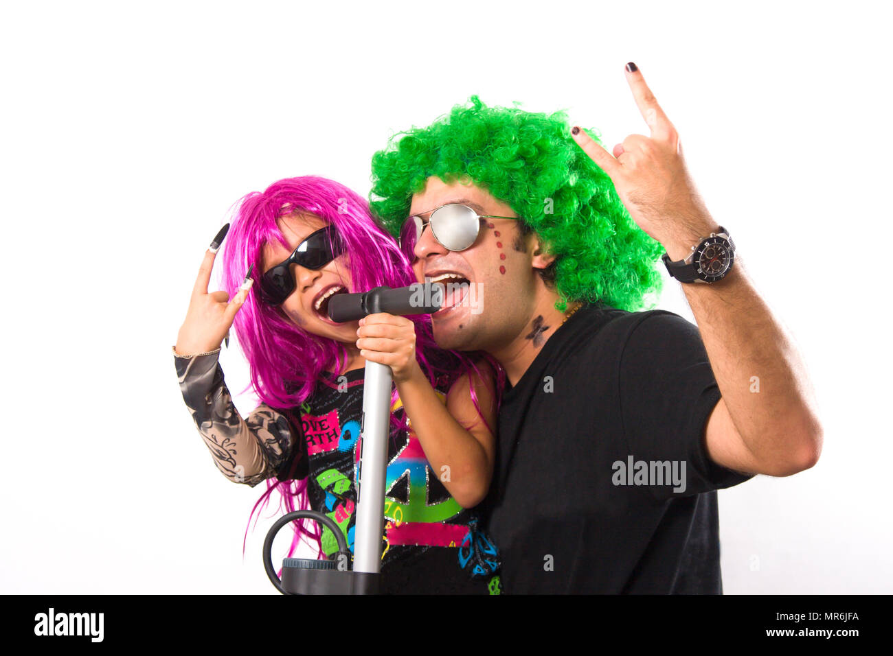 Portrait d'une rock star père et fille chanter Banque D'Images