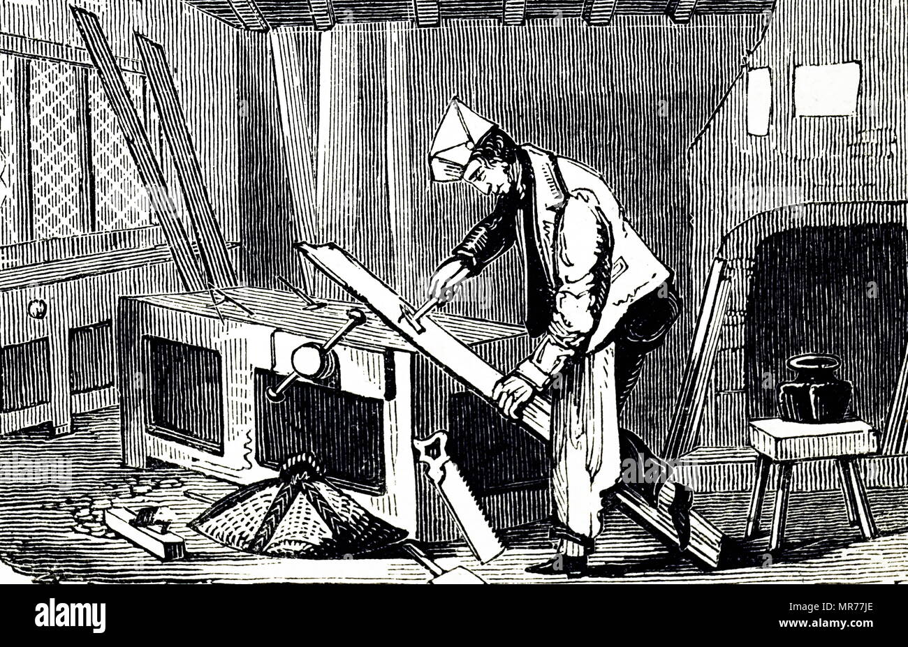 Gravure représentant un dessin carpenter un clou d'une planche à l'aide d'un marteau de griffes tordues comme un levier. En date du 19e siècle Banque D'Images