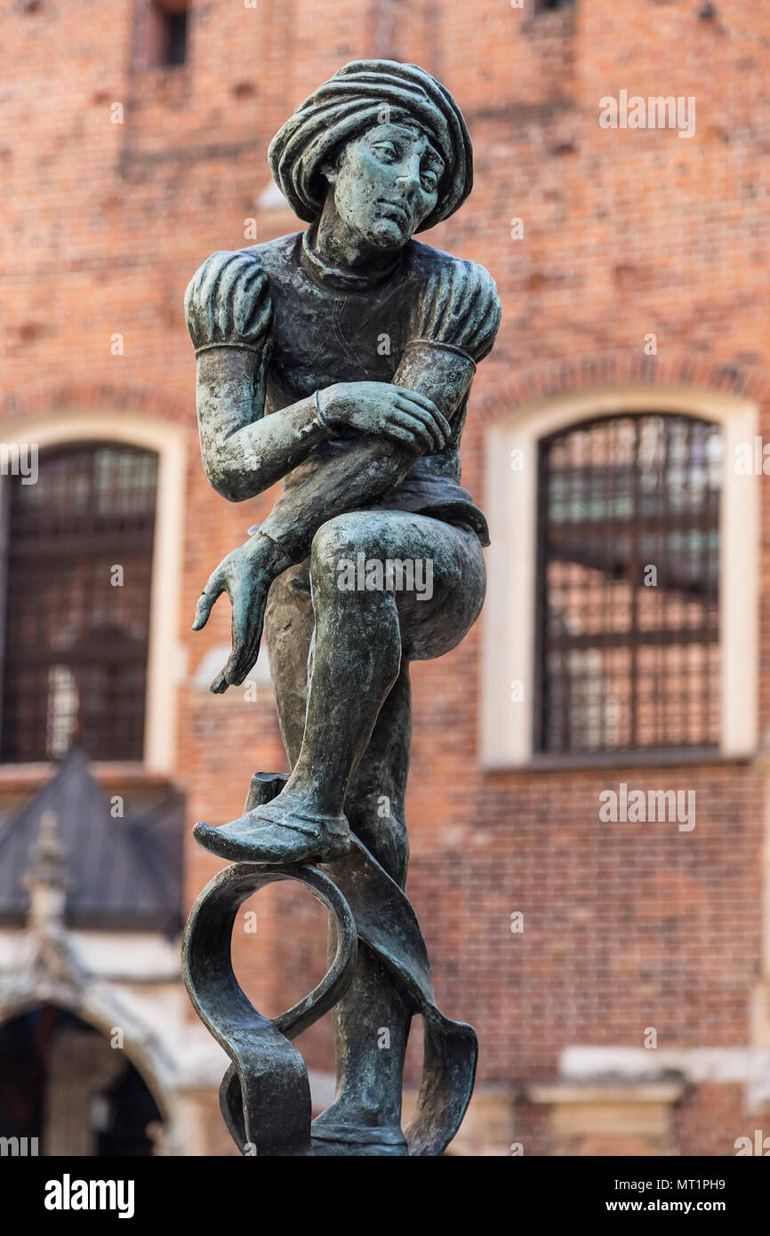 Sculpture pauvre étudiant dans la fontaine de la Plaza Mariana. Cracovie. Pologne Banque D'Images