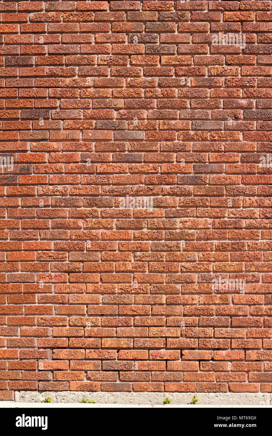 Vue rapprochée d'un vieux mur de brique texturé vintage avec fond en briques de couleur brun motif d'obligations d'exécution traditionnelles Banque D'Images