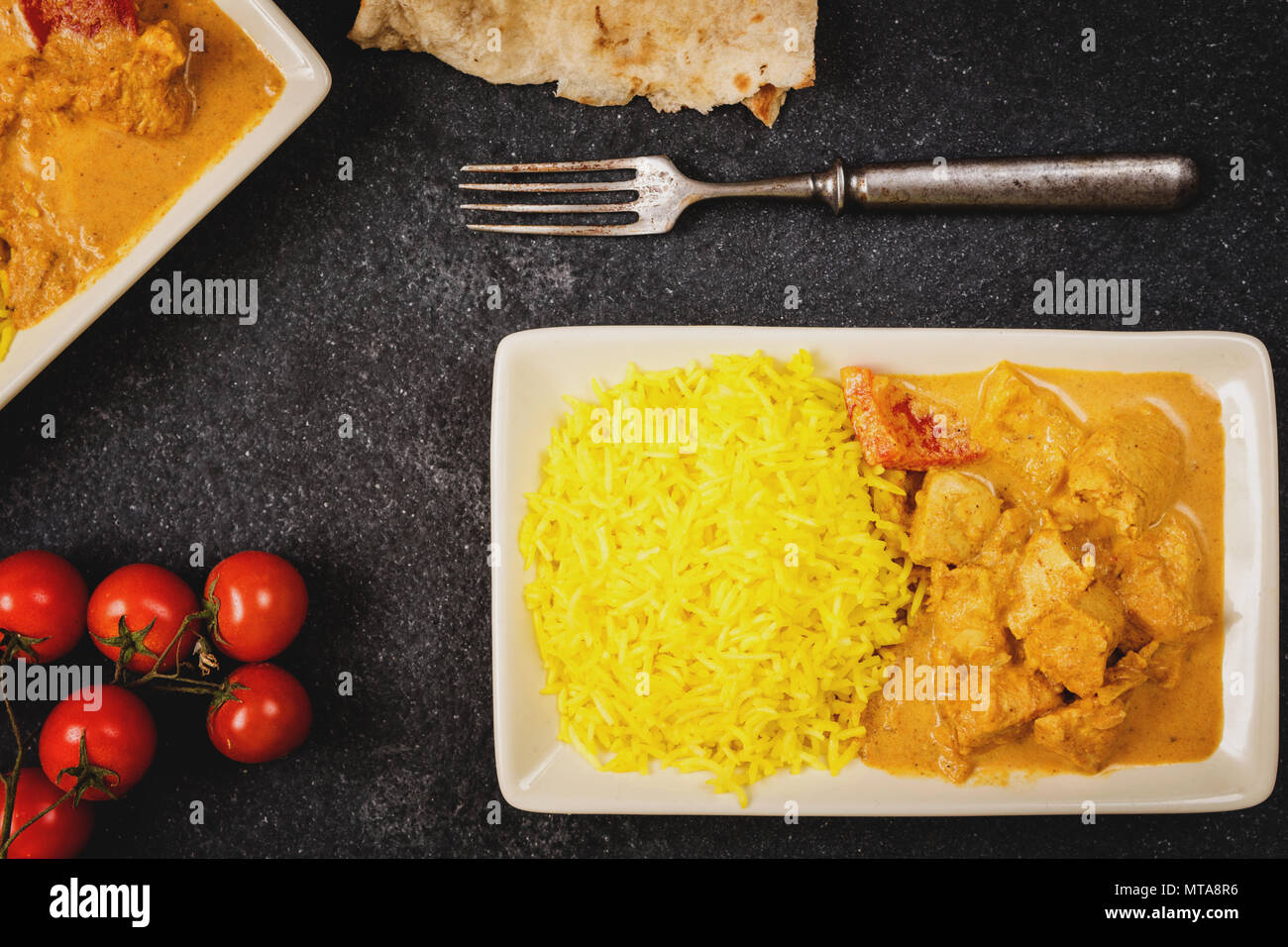 Beurre masala poulet avec riz au jasmin et chapati Banque D'Images