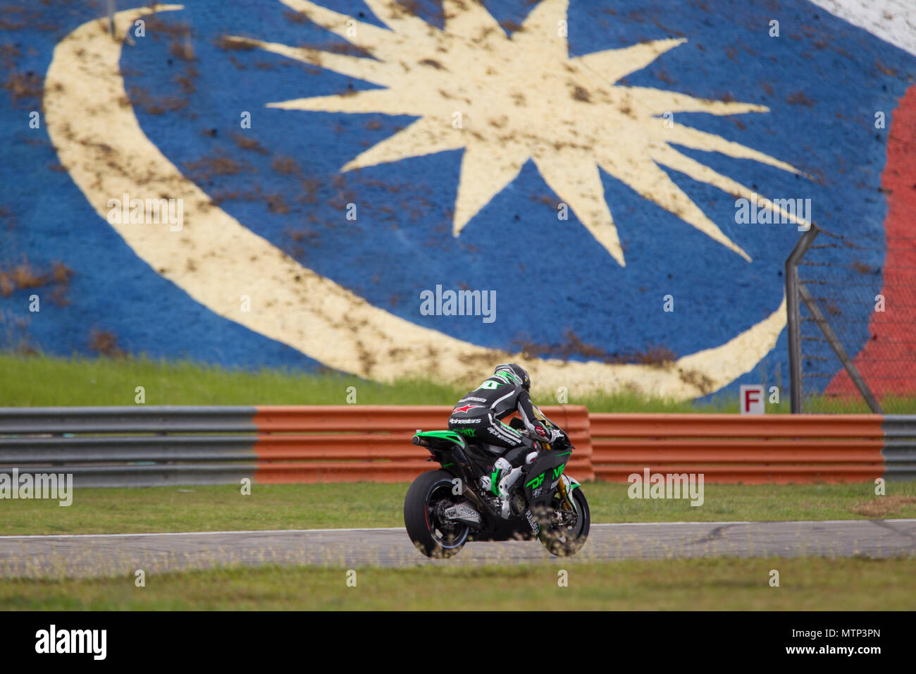 Riders prendre pour le circuit au niveau du site officiel MotoGP test d'hiver au circuit Sepang en Malaisie. Banque D'Images