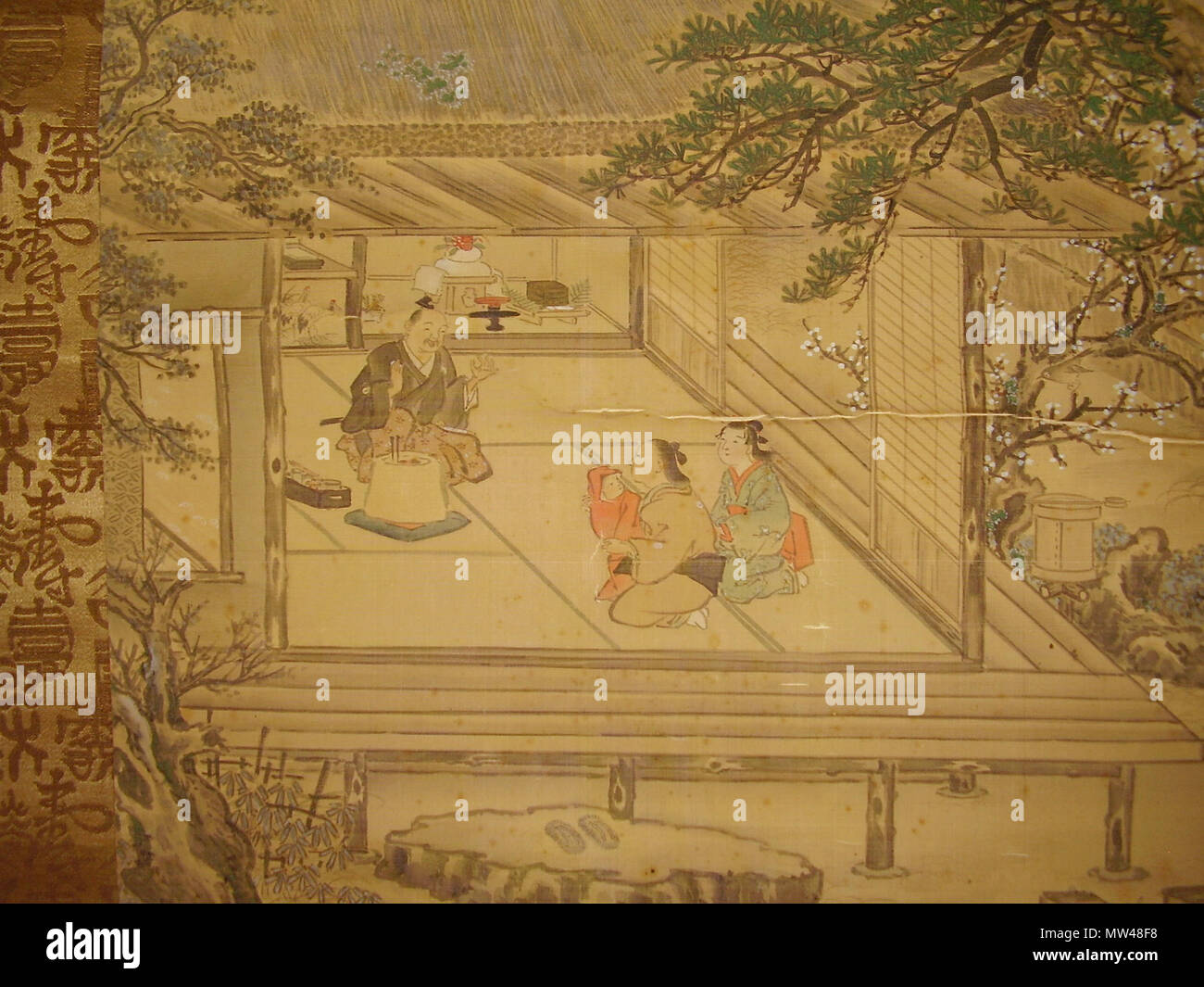 . Anglais : Détail (vue intérieure) d'une peinture d'un "traditionnel" idéalisée du Nouvel An japonais ; on ne sait pas exactement si les célébrations ont lieu sur les "anciens" ou "nouveaux" date pour le nouvel an au Japon (chinois traditionnel, ou 'Occidentaux' nouvel an), peut-être il s'agit d'une représentation fidèle d'un 'vieux' date de célébration, étant donné l'arbre fleurs de printemps & more-comme la végétation ; la deuxième moitié du 19ème siècle, très fin de la période Edo à l'ère Meiji (Meiji probablement plus) ; la peinture est signé et scellé, artiste pas (encore) identifié -- nous avons besoin d'aide !, peint à la main sur soie, kakejiku (scroll-Canada-pa Banque D'Images