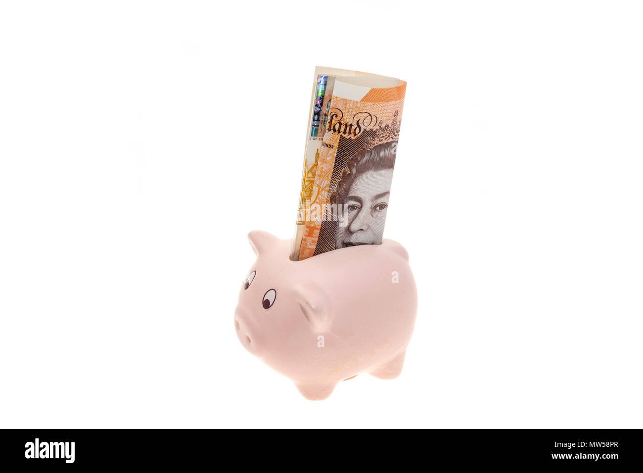 Piggy Back avec une note de dix livres britanniques - Fond blanc Banque D'Images
