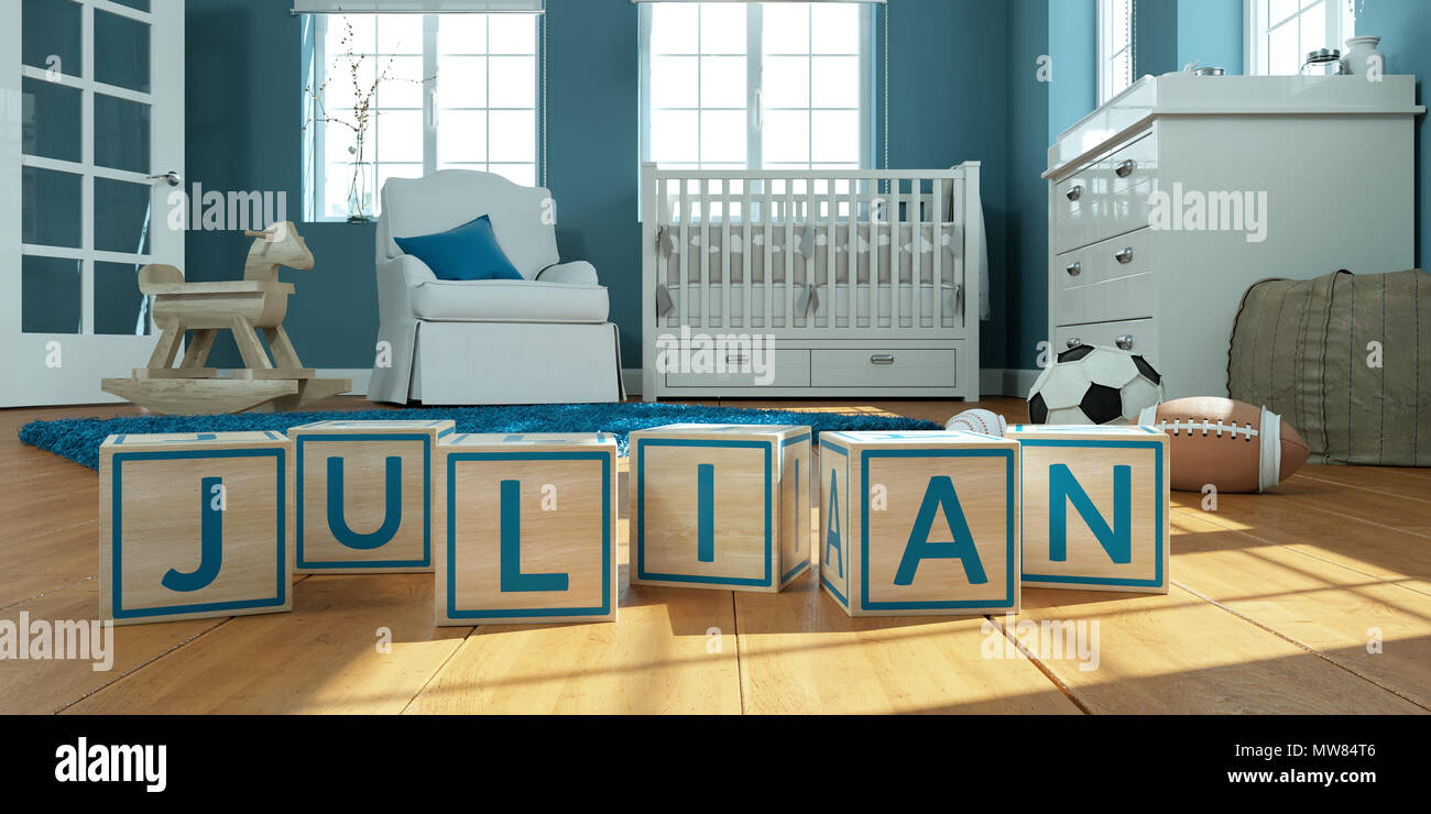 Le nom julian écrit avec des cubes en bois dans la chambre des enfants Banque D'Images