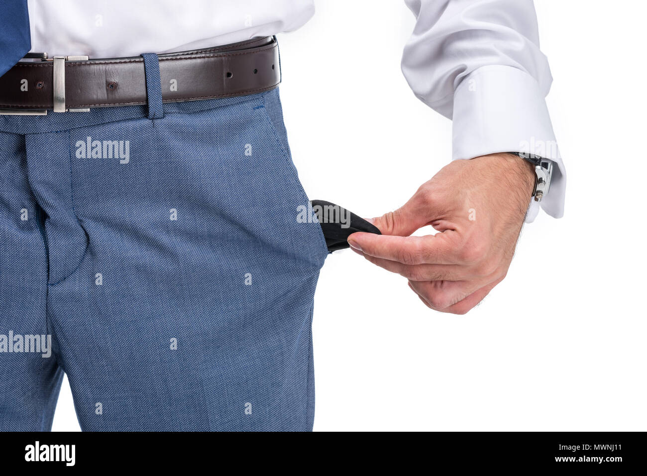 Portrait de l'homme pauvre avec poche vide, isolé sur blanc Banque D'Images