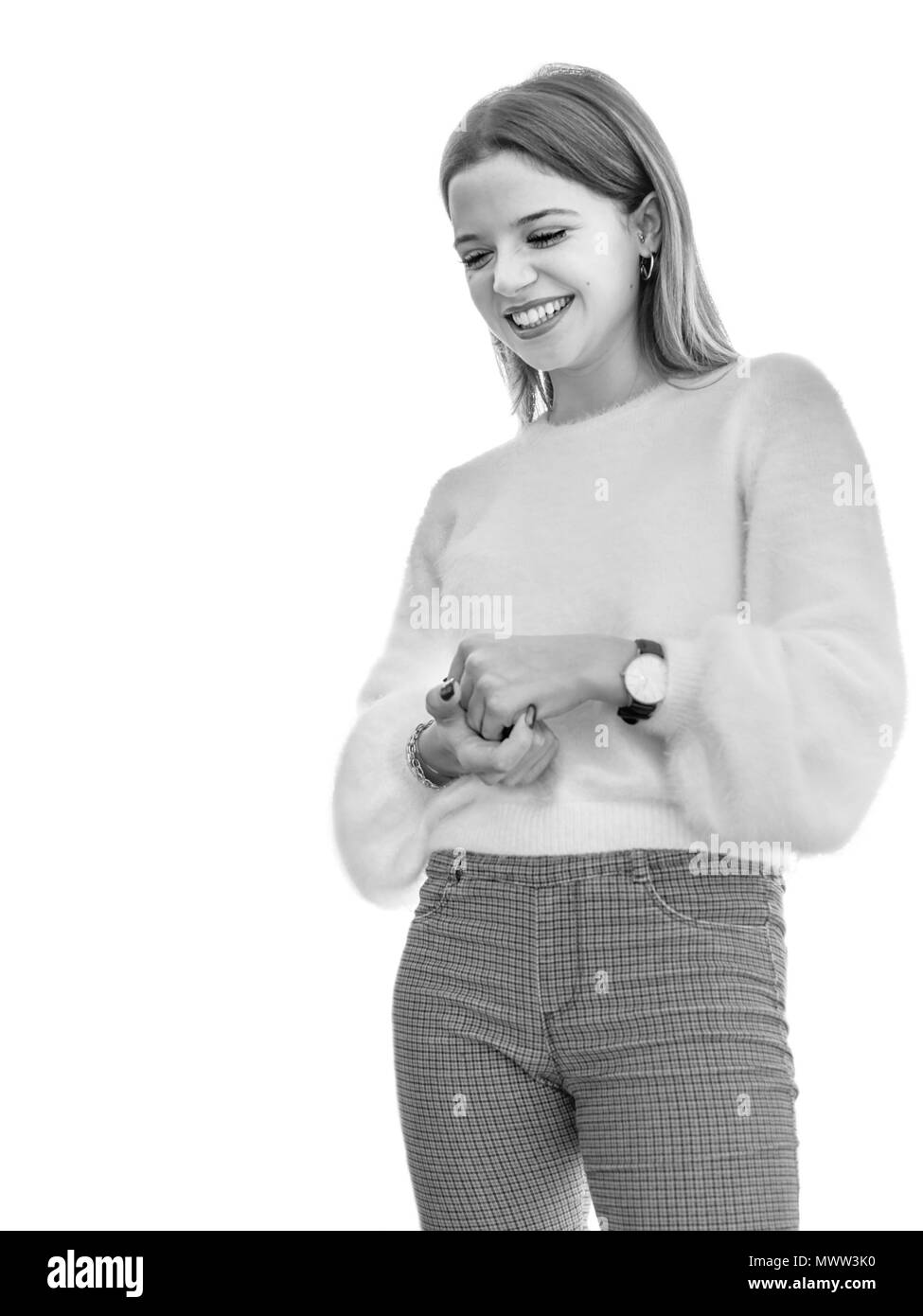 Girl smiling et embarrassé sur fond blanc Banque D'Images