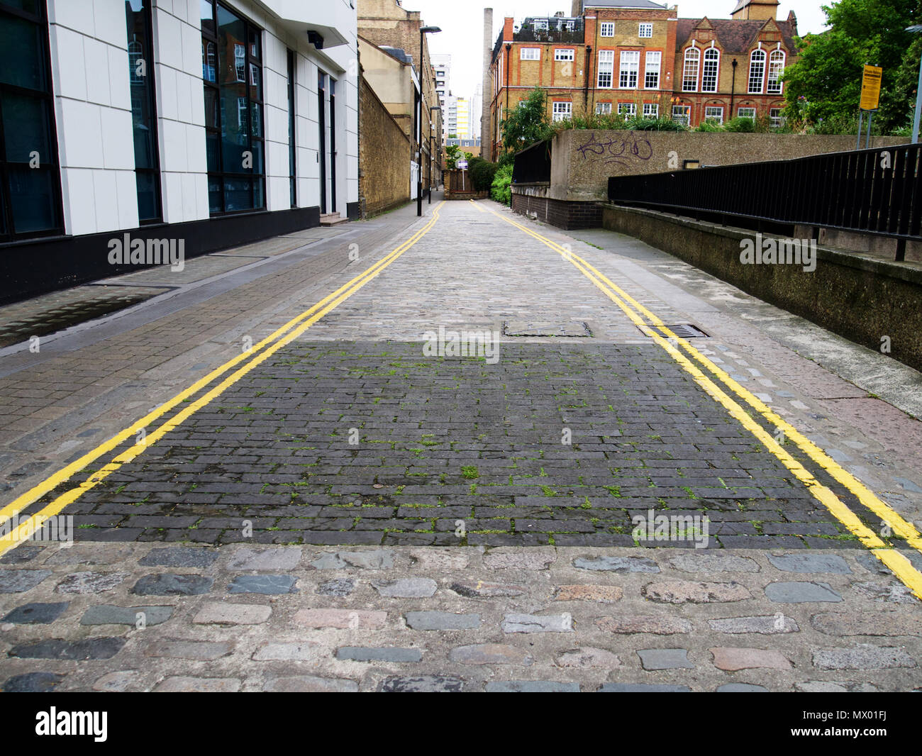Le dernier morceau de route en bois en surface Chequer Street, Londres Banque D'Images