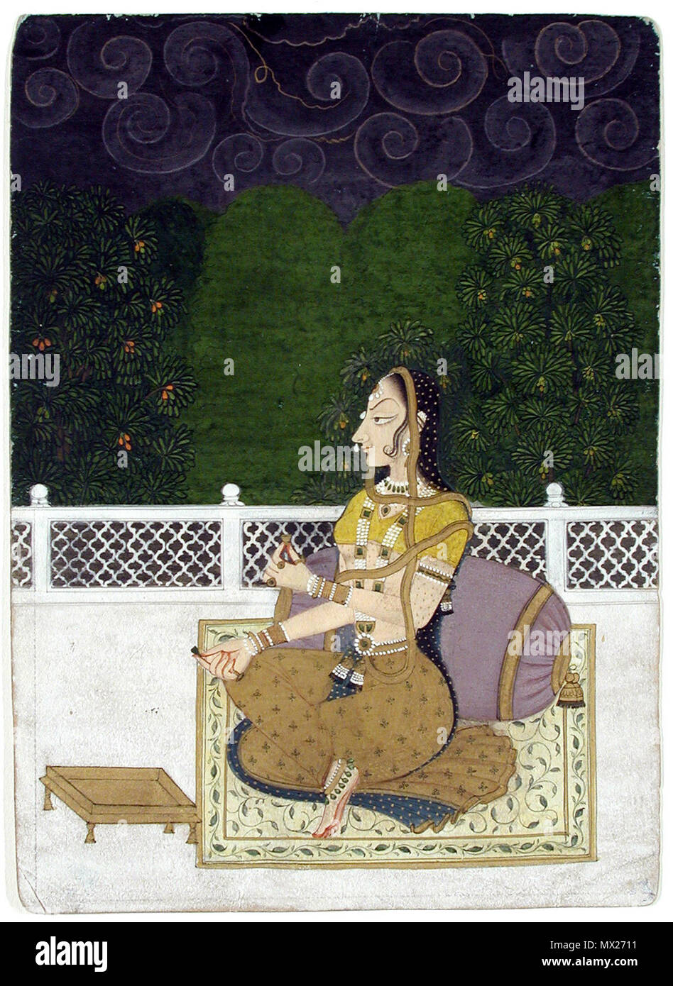 . Une belle femme assise contre un traversin . Anglais : une belle femme assise contre un traversin. Kishangarh,1775, San Diego Museum of Art . 27 juillet 2001. Inconnu 17 5 une belle femme assise contre un traversin. 1775, San Diego Museum of Art Banque D'Images