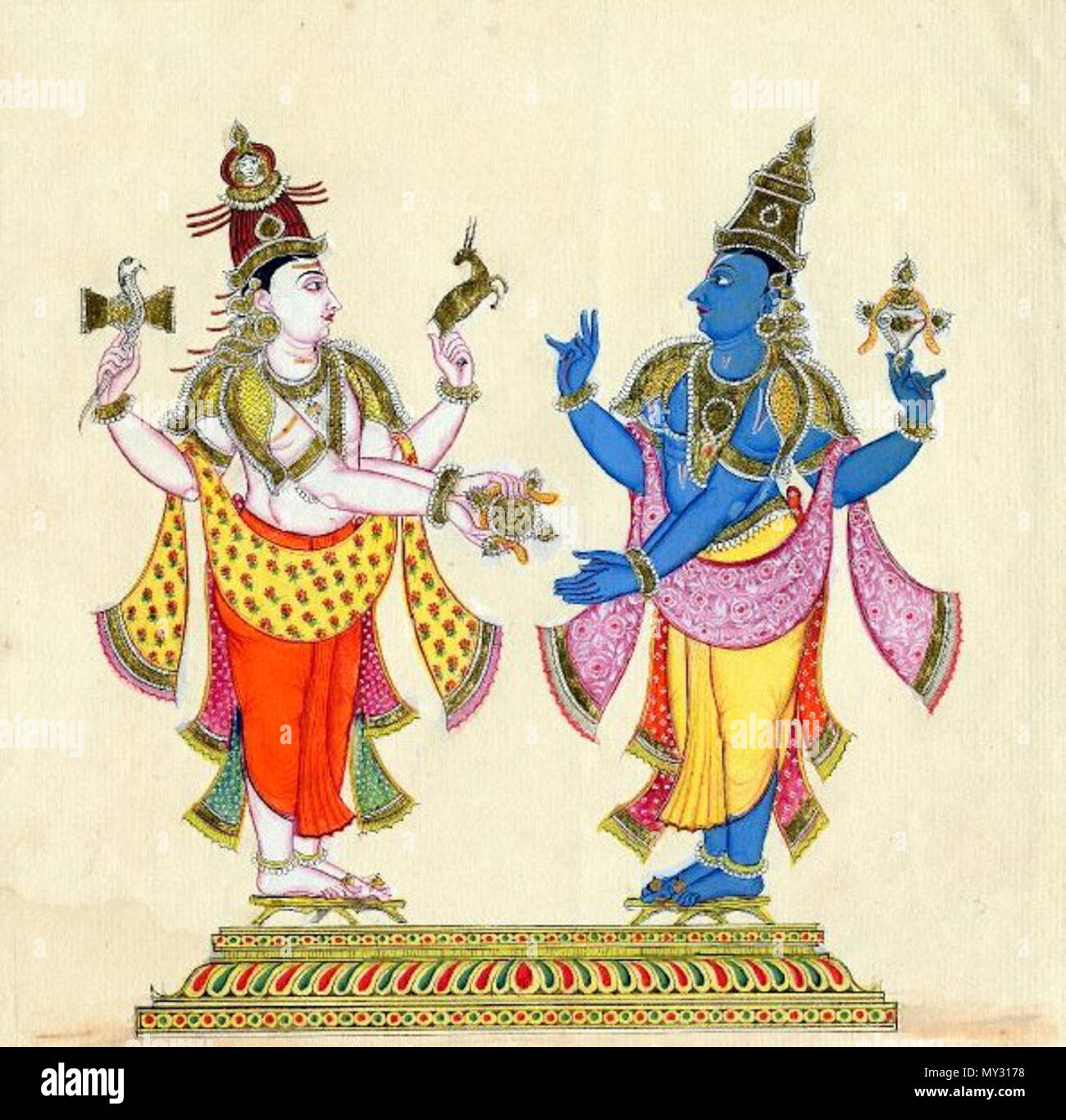. English : 'Peinture de Siva présentant le cakra de Viṣṇu. Les deux dieux se tenir face à face sur une plate-forme. Ils sont tous deux quatre bras avec Siva holding damaru dans son coin supérieur droit et mrga dans son coin supérieur gauche. Avec ses deux mains il profers le cakra de Viṣṇu. Viṣṇu tient ses deux mains vers Siva pour recevoir le Cakra et son coin supérieur droit est en attente de prendre l'arme ; sa partie supérieure gauche tient la sankha. Siva porte la jata où Ganga est vu ; Viṣṇu est couronné. Sur papier européen filigranés avec 'W. Thomas'.' . vers 1820. 553 Inconnu Vishnu Shiva Banque D'Images