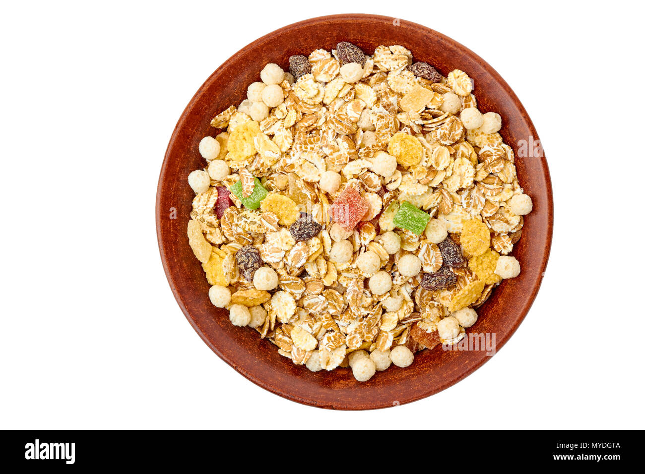 Bol de muesli avec des fruits exotiques séchés on white Banque D'Images