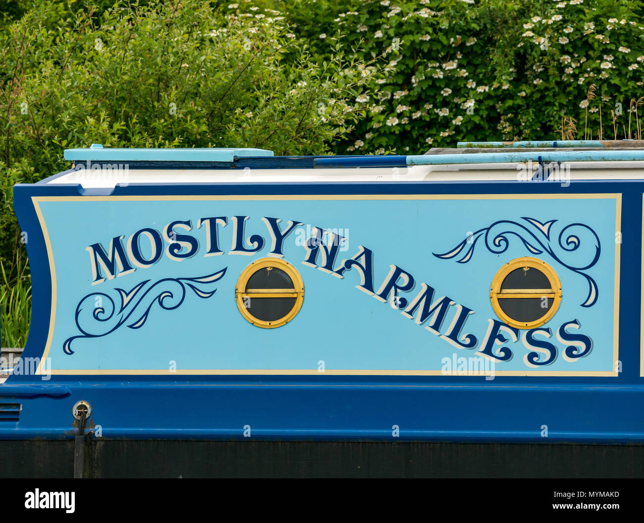 Nom humoristique inoffensive surtout barge péniche avec hublots, Forth & Clyde Canal, Falkirk, Ecosse, Royaume-Uni Banque D'Images