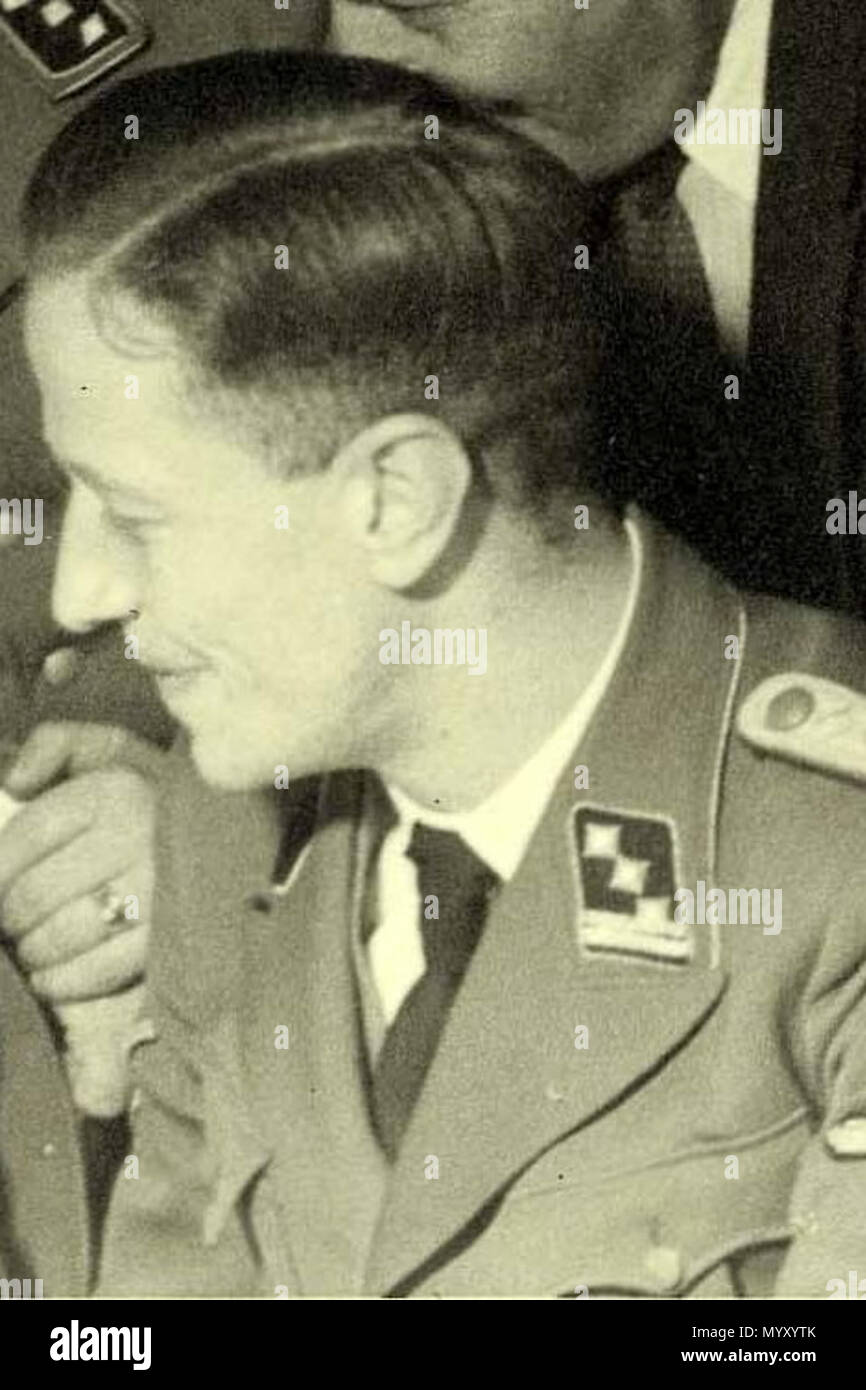 . Anglais : criminel de guerre allemand Ferdinand aus der Fünten (1909-1989) (en bas à droite), deux autres officiers SS (Gemmeker & Hassel) et M. Scheltnes. Camp Westerbork, 'Bal' (près de Noël), 1942. Nederlands : Kerstmis à Westerbork, 'Joelfeest' 1942. Van Kampcommandant liens naar rechts : Obersturmführer SS Albert Konrad Gemmeker, SS untersturmführer Hassel, SS Hauptsturmführer aus der Fünten en Scheltnes van de firma Lippmann Rosenthal & Co . Décembre 1942. Rudolf Breslauer 33 FAusDerFunten (rognée) Banque D'Images