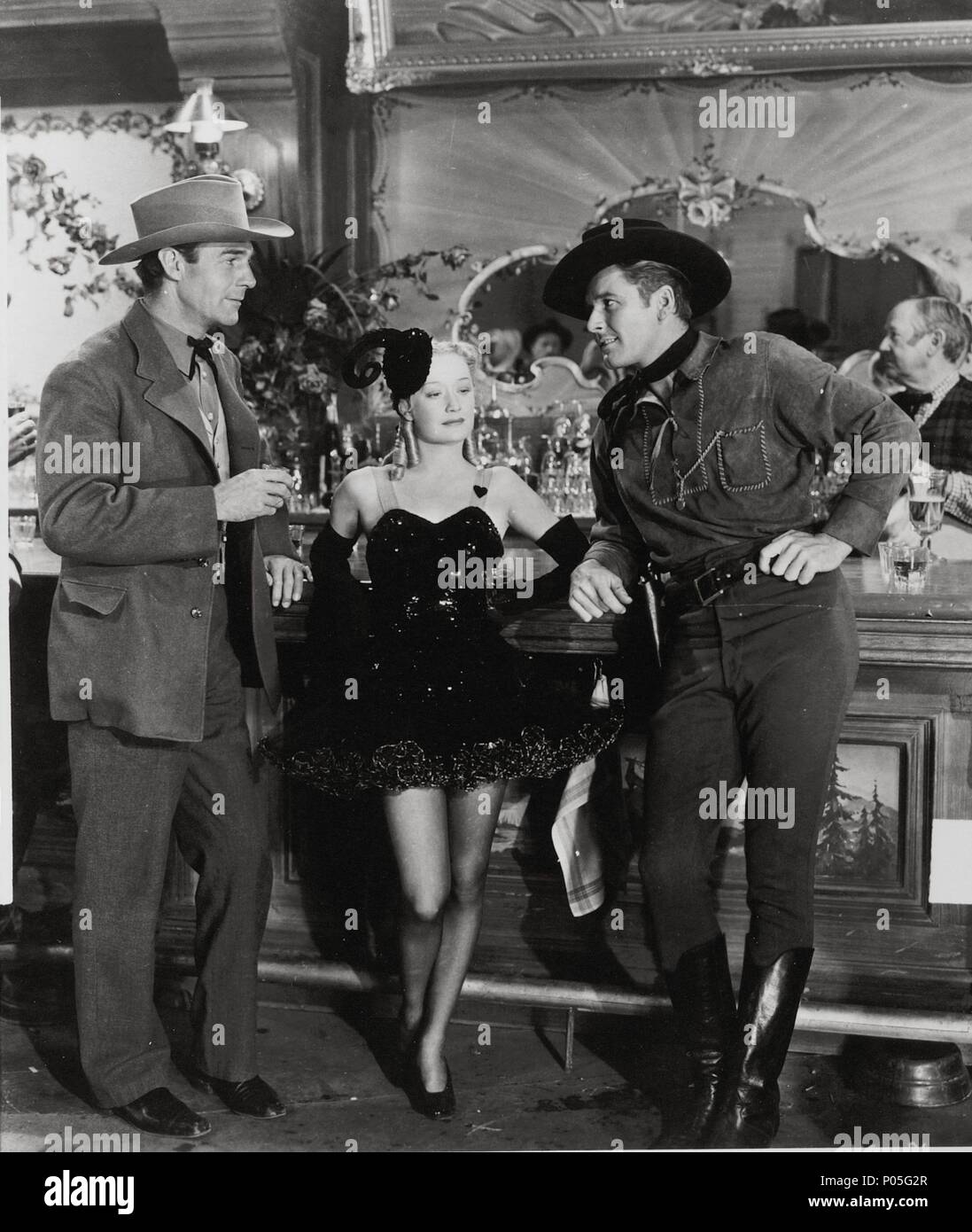 Titre original : VIRGINIA CITY. Titre en anglais : VIRGINIA CITY. Film Réalisateur : Michael Curtiz. Année : 1940. Stars : MIRIAM HOPKINS, Errol Flynn, RANDOLPH SCOTT. WARNER BROS/crédit : premier album / NATIONAL Banque D'Images