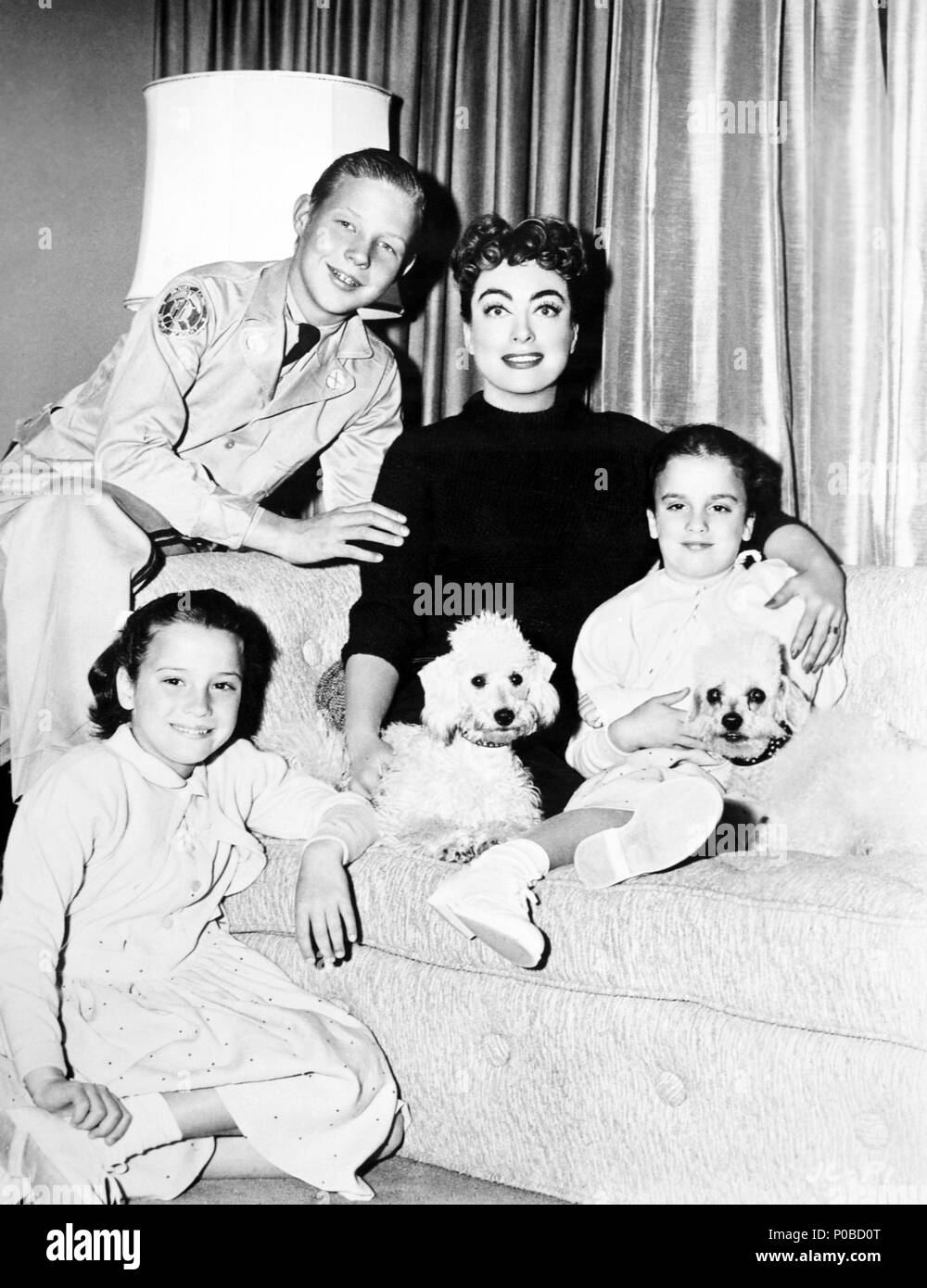 Description : Joan Crawford's family.. Stars : Joan Crawford. Banque D'Images
